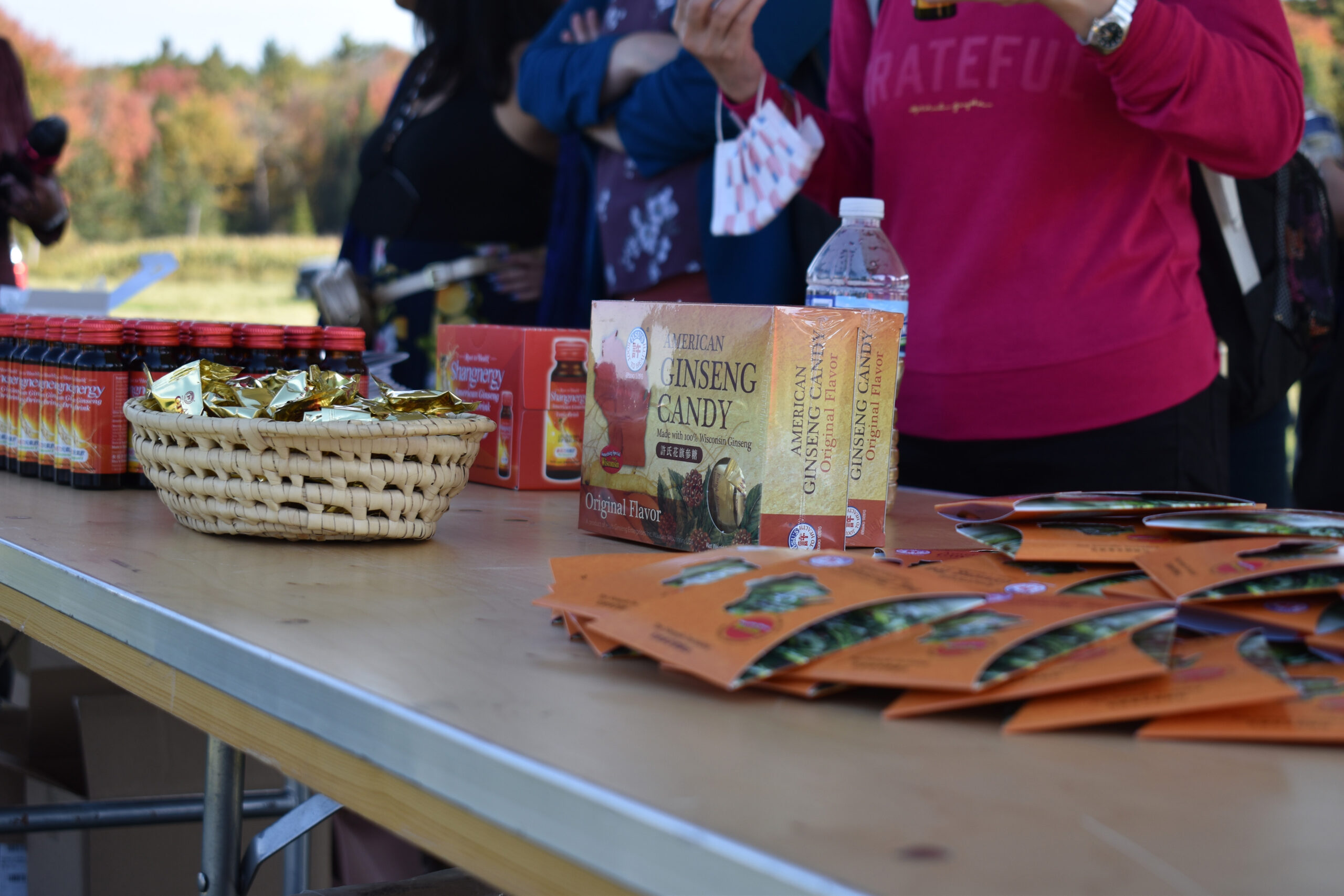 Ginseng products are arrayed on a table at an event in Wausau