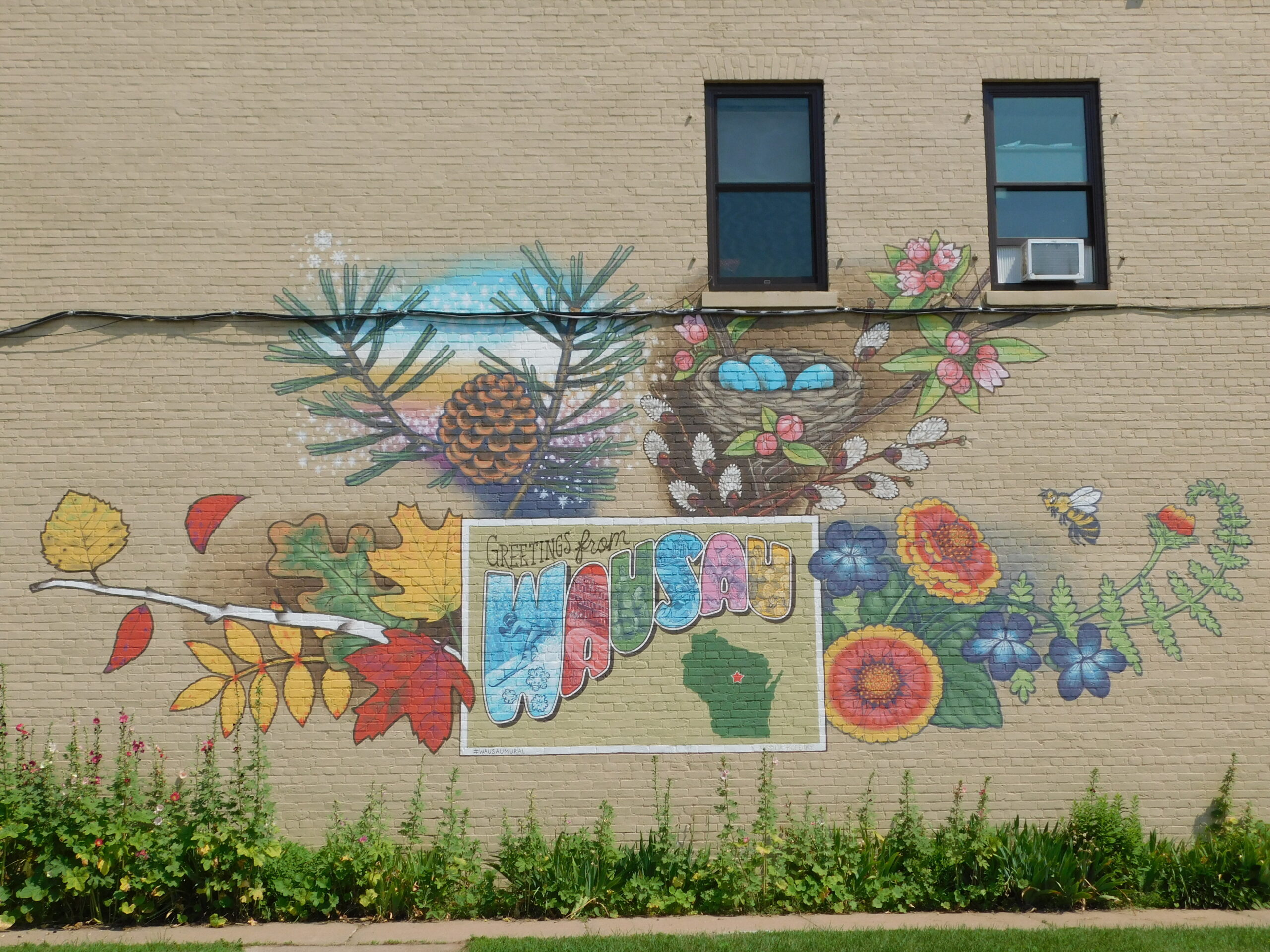 Building mural with leaves, flowers