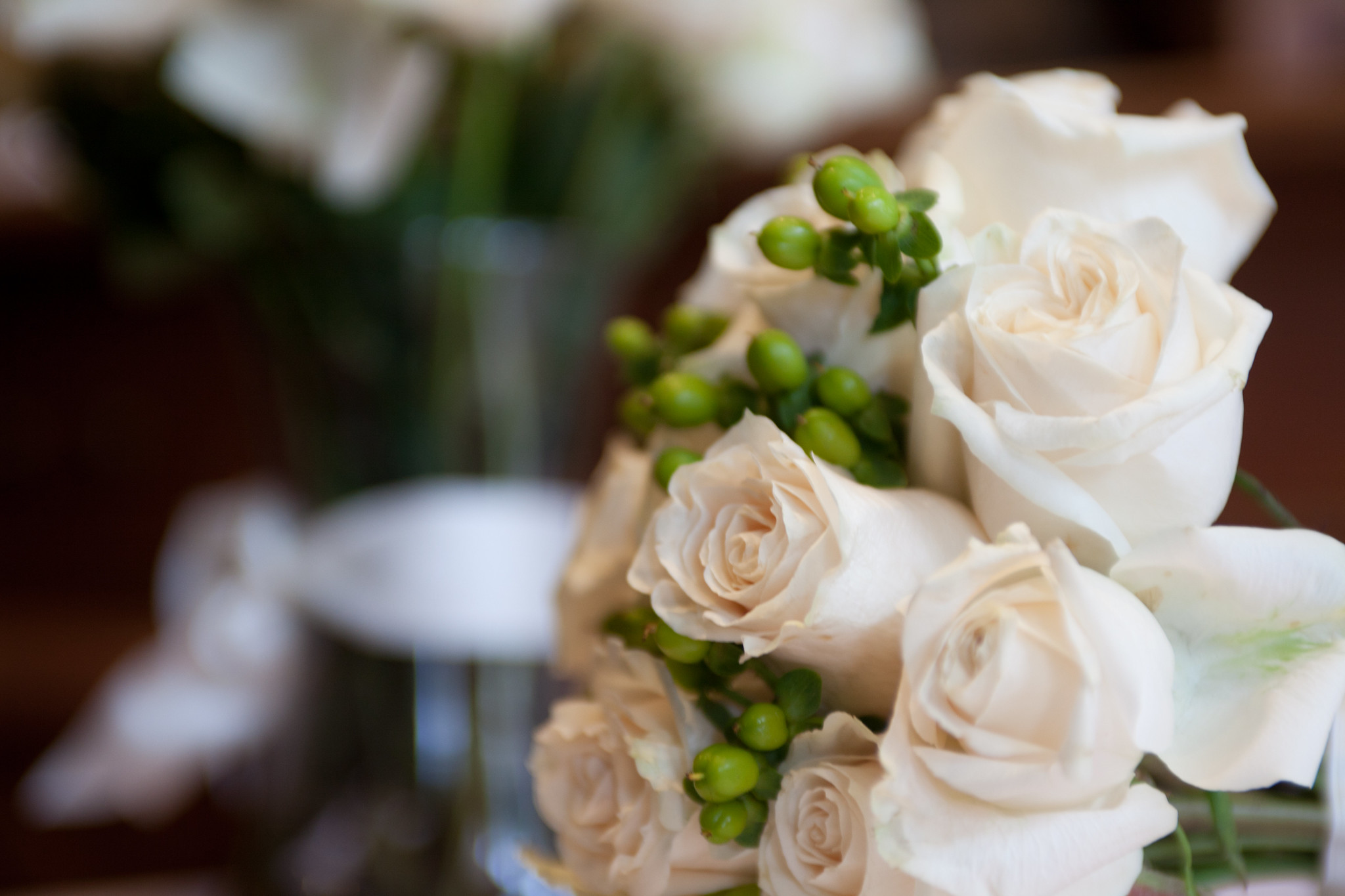 A wedding bouquet of white and light pink roses