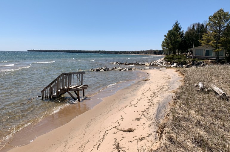 The position of steps going into Whitefish Bay in Door County illustrates erosion along the beach