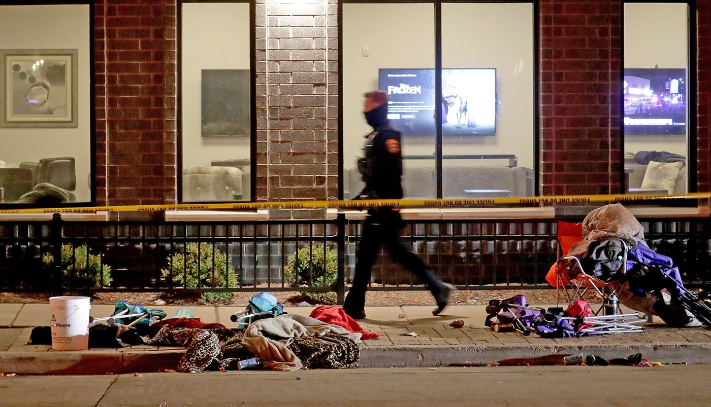 Police investigate after SUV crashes into people at Waukesha Christmas Parade on Sunday.