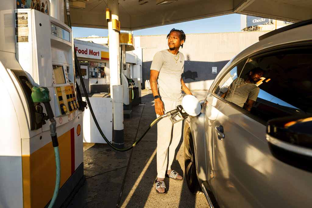 A motorist fills up at a Shell station on Monday, Nov. 22, 2021, in San Francisco.