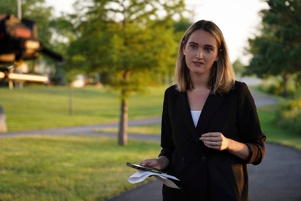 Jena Friedman interviewing guest outside in episode of "Indefensible"