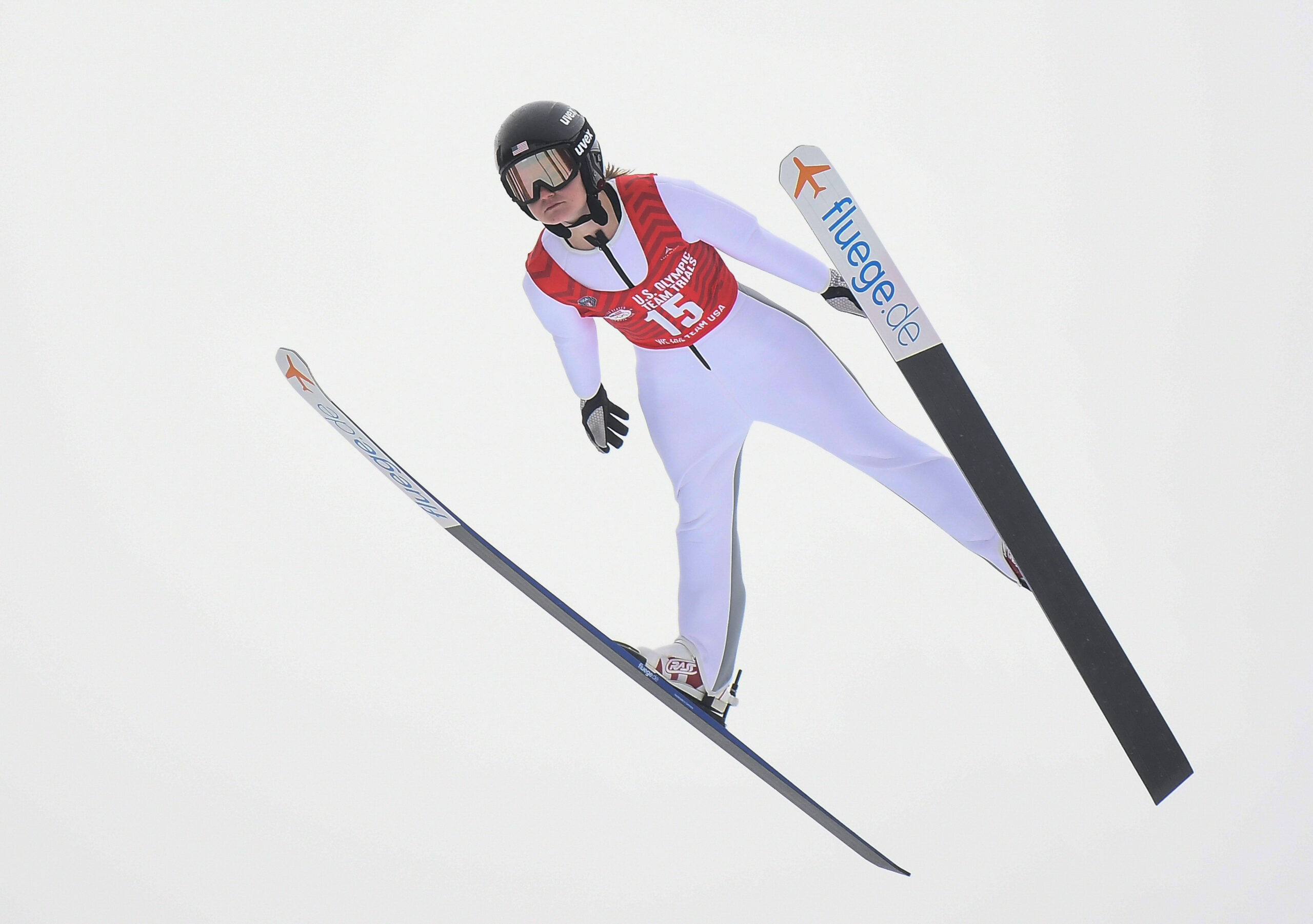Anna Hoffman soars through the air during the women's ski jumping competition