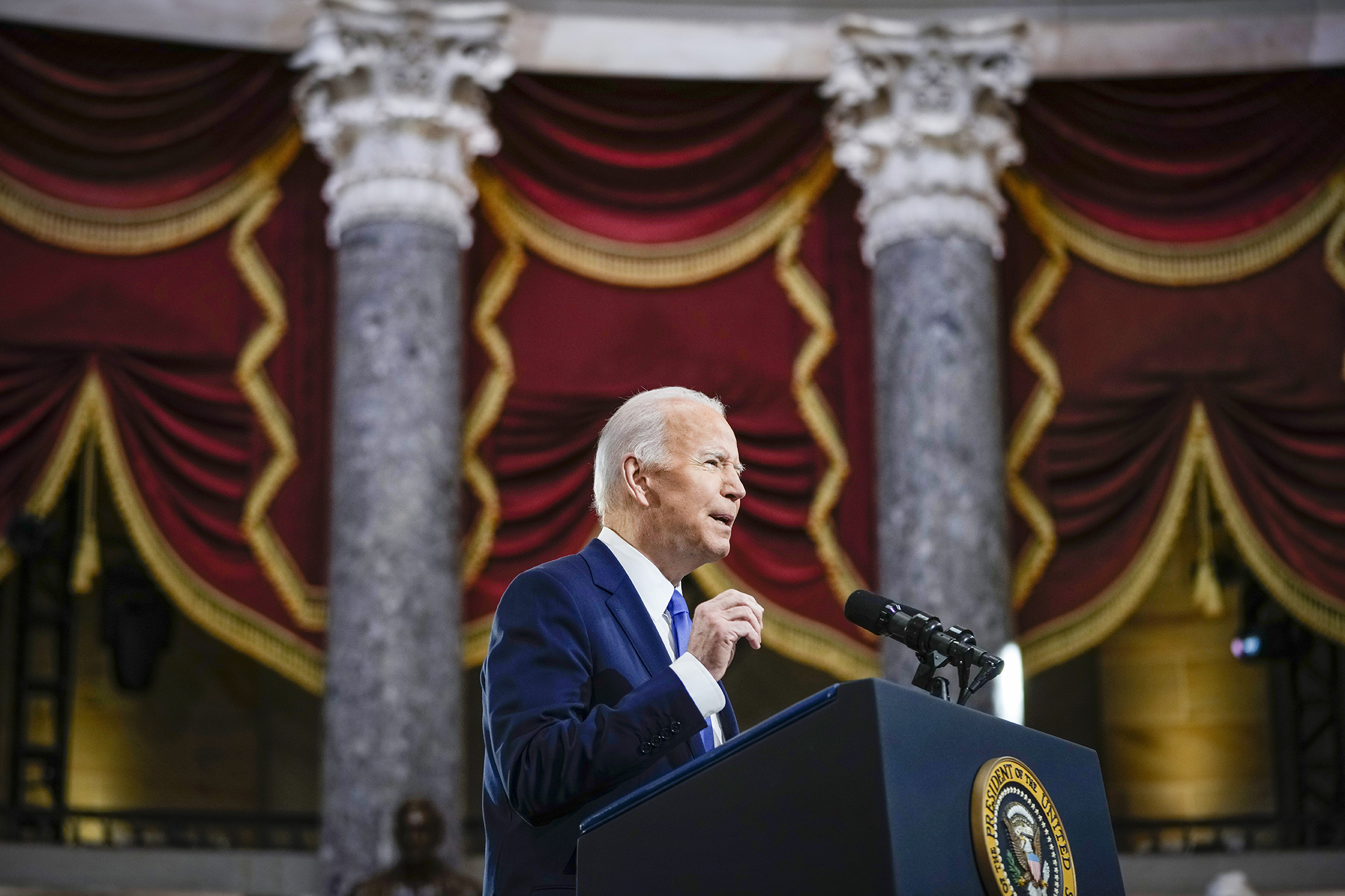 President Joe Biden speaks from Statuary Hall at the U.S. Capitol