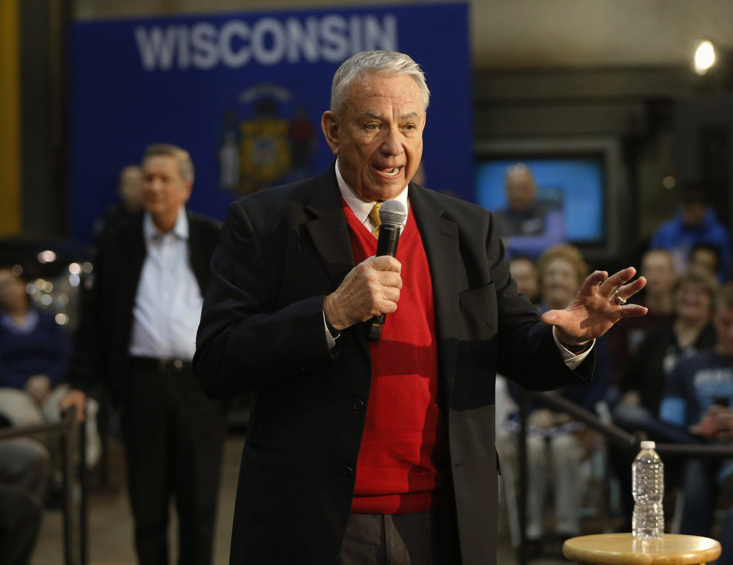 former Wisconsin Gov. Tommy Thompson addresses a crowd with John Kasich
