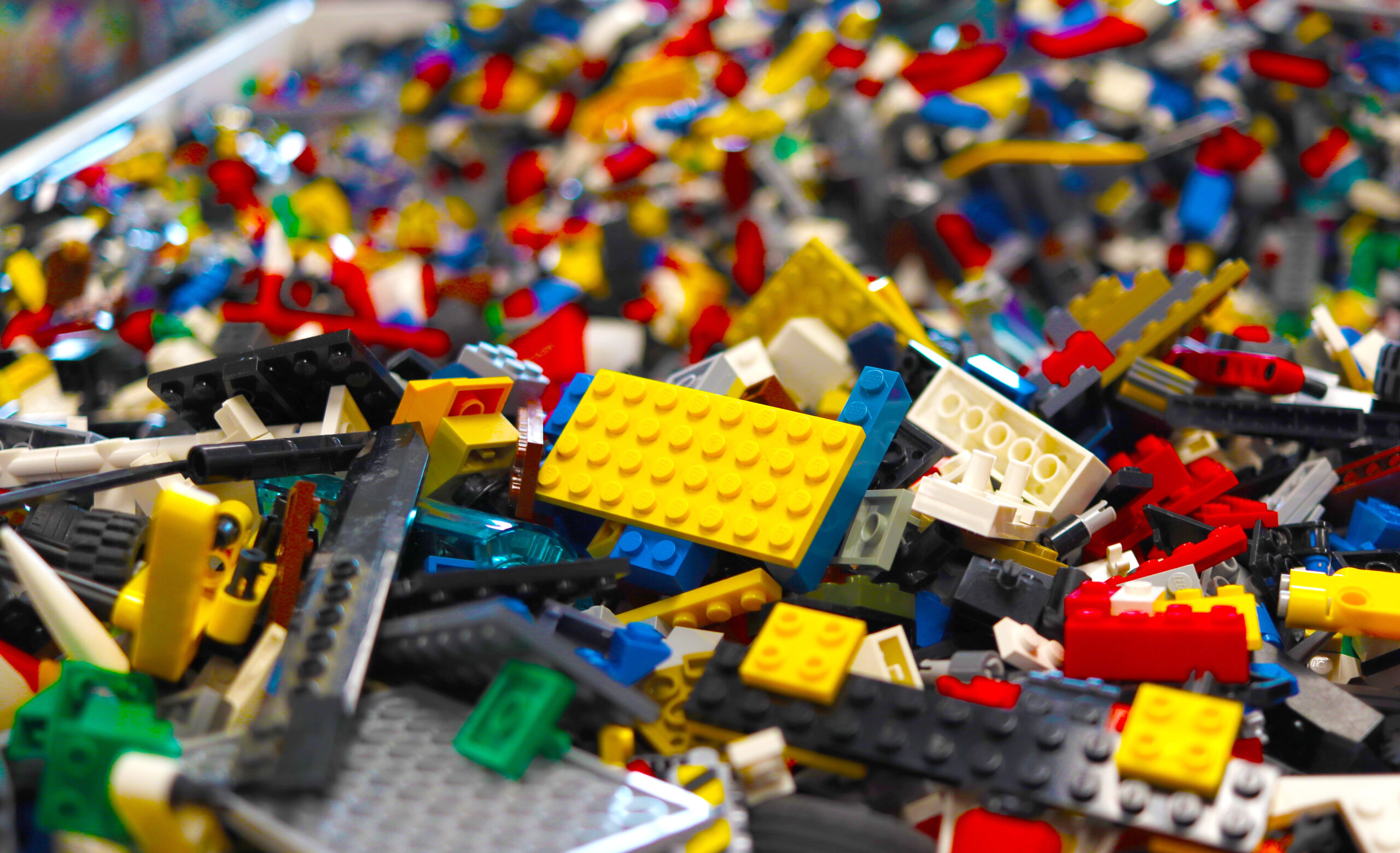 Lego builders hunting for the perfect piece can dig through huge bins full of bricks and other pieces at stores like Bricks & Minifigs in Madison