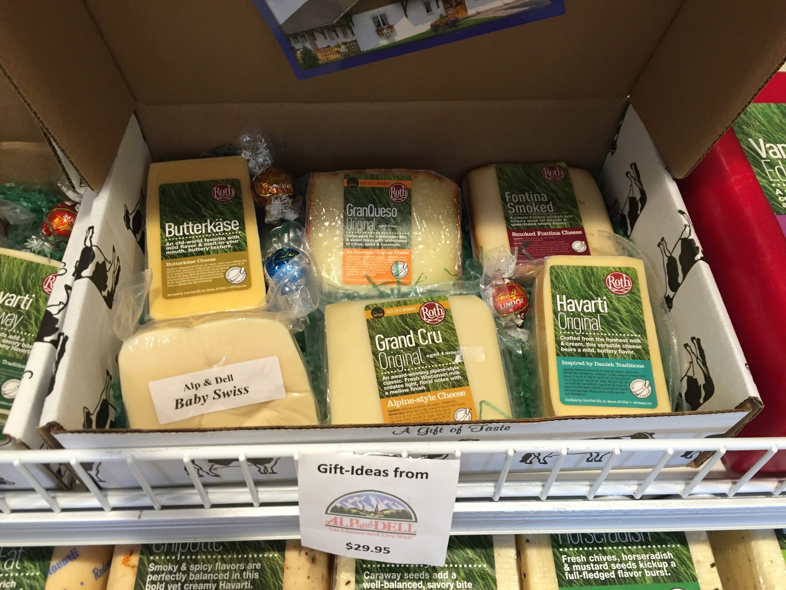 Emmi Roth cheeses are shown in a gift box