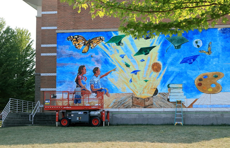 A mural is painted on the Boys & Girls Club of Janesville's building