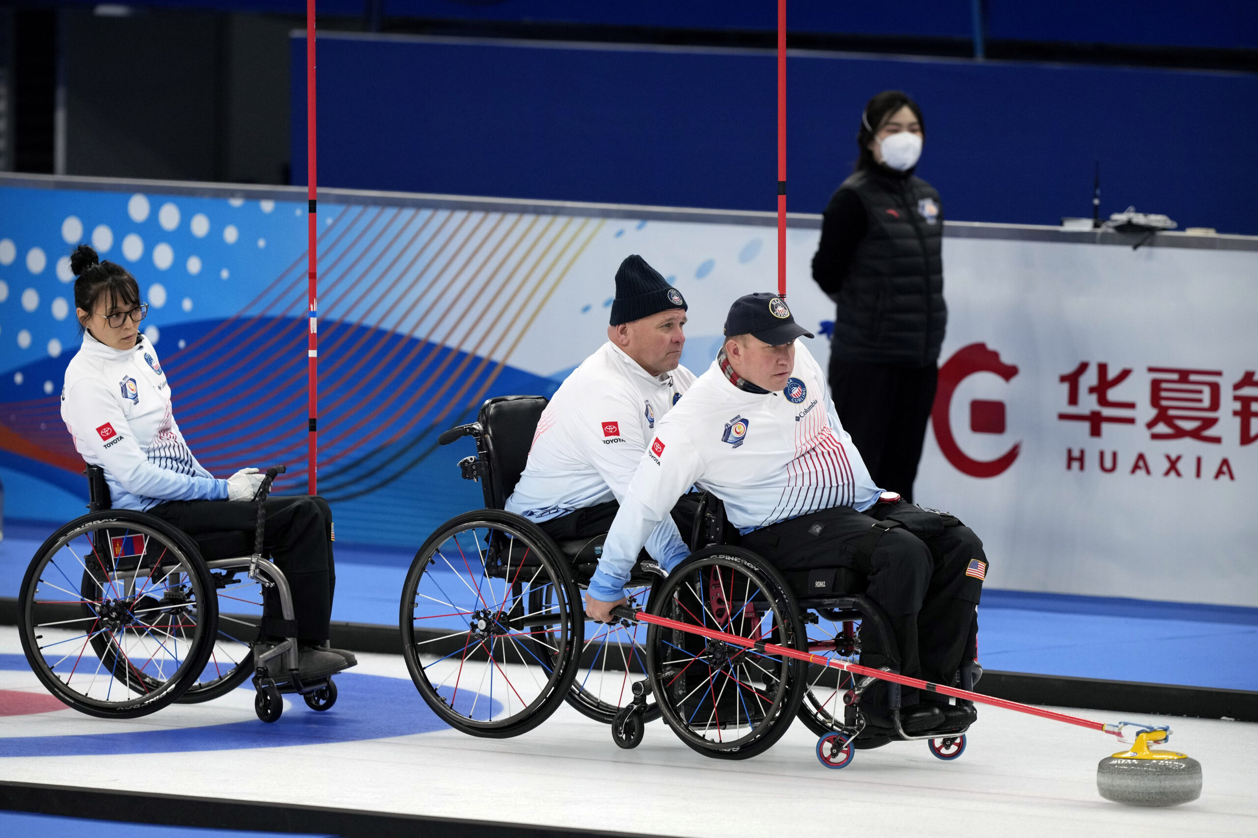 Batoyun Uranchimeg, David Samsa, and Matthew Thums of the United States compete during their semifinal match against Canada at the World Wheelchair Curling Championship