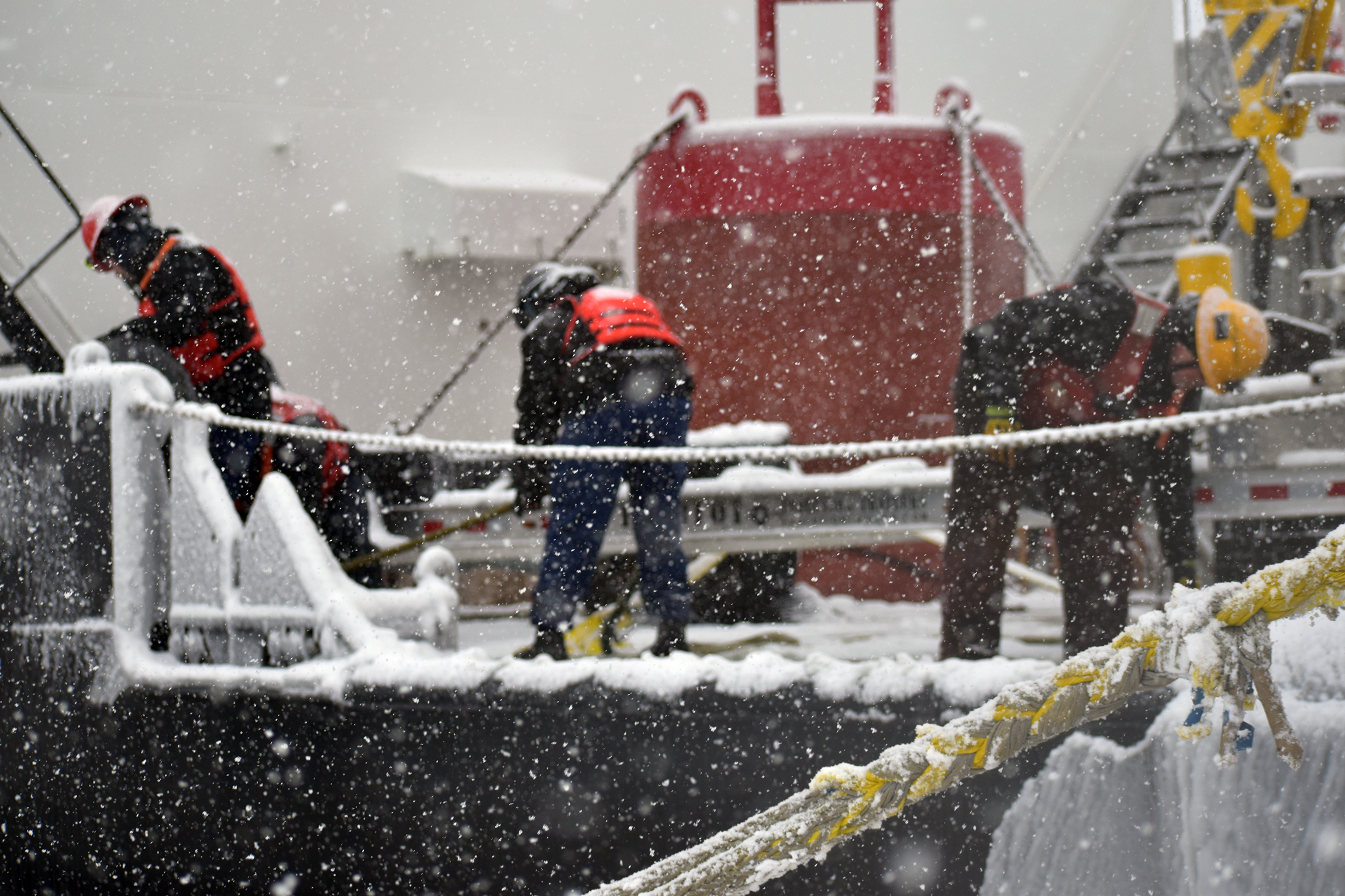 Crew working on the Coast Guard cutter Spar