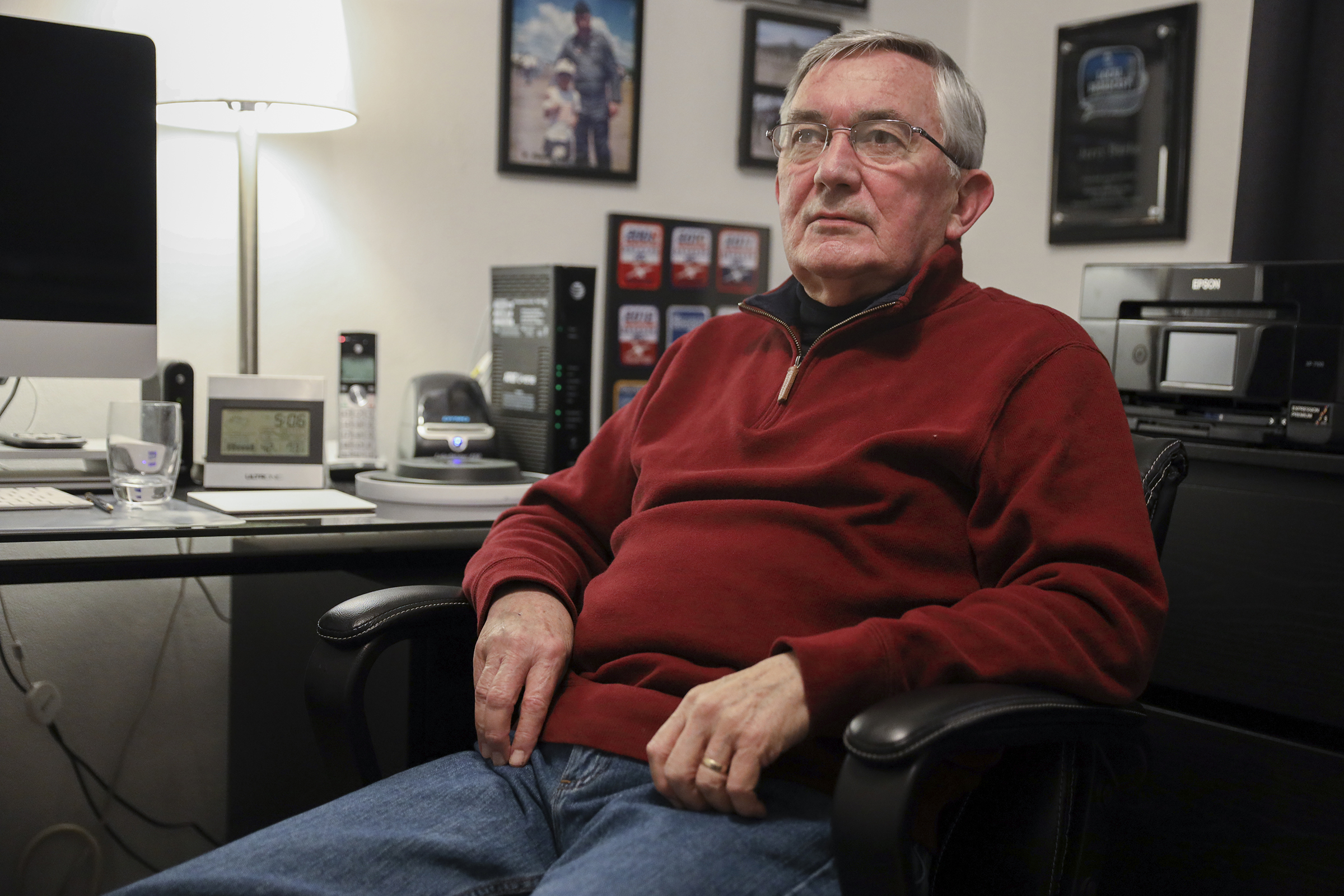 Jerry Burke sits in an office