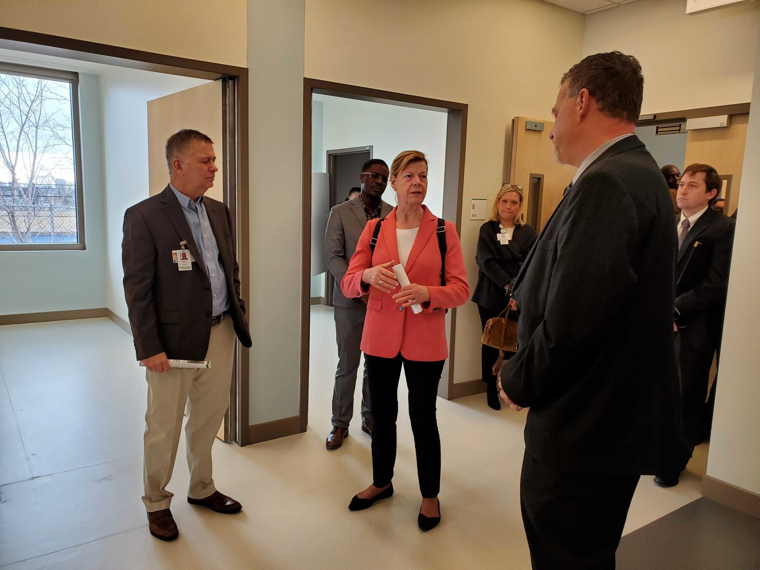 Sen. Tammy Baldwin takes a tour of a new mental health emergency care facility in Milwaukee