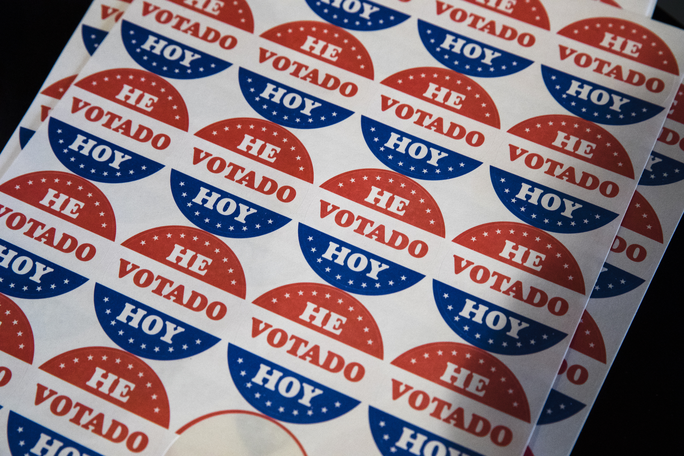Stickers that read "He Votado Hoy," which means "I voted today" in Spanish