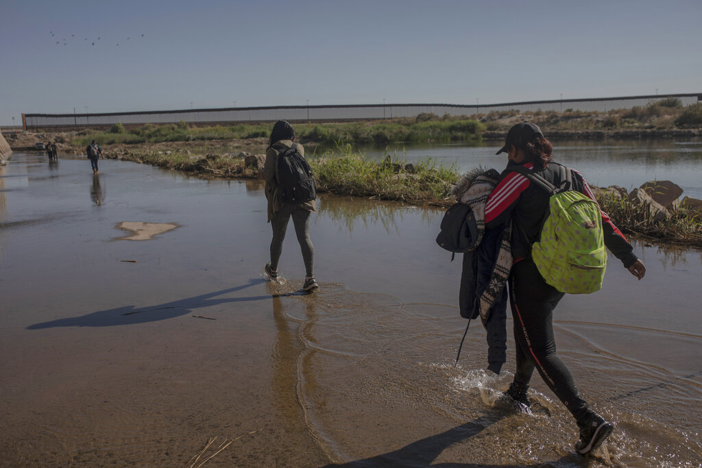 Nicaraguan migrants walk near the US-Mexico border, in Algodones, Baja California, Mexico.