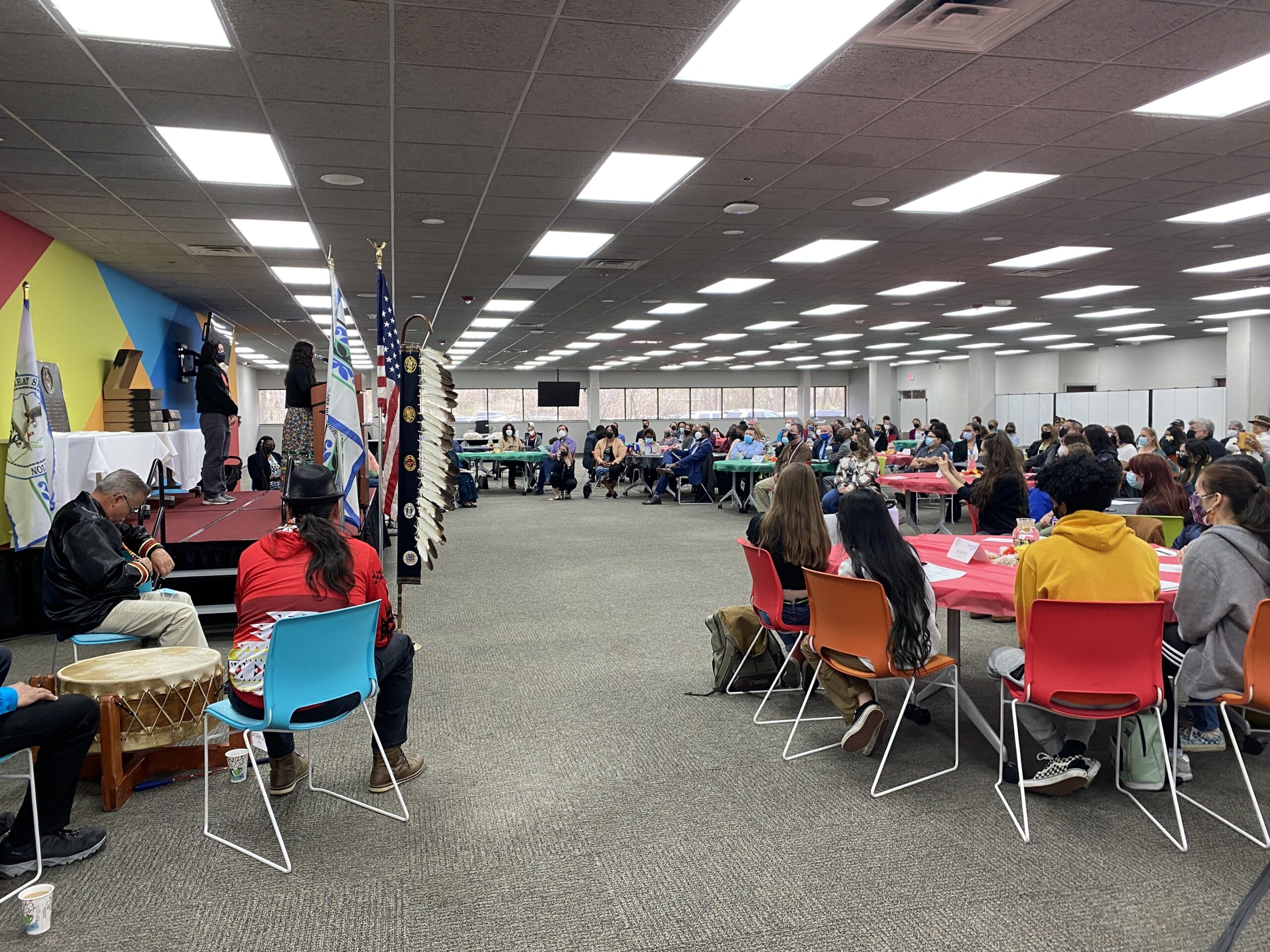 Guests listen to speeches at Monday's land acknowledgement ceremony