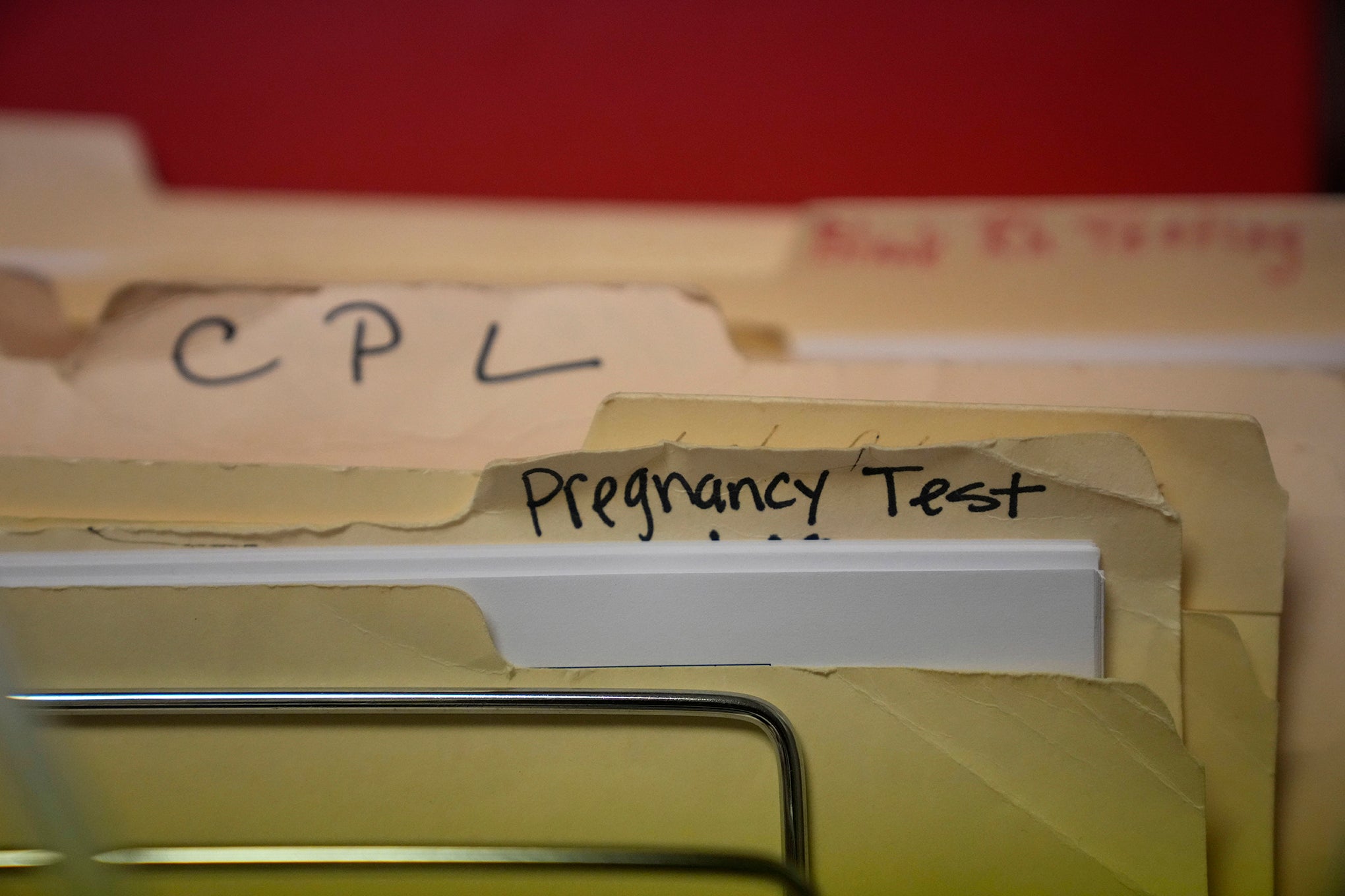 Lab folders of pregnancy tests