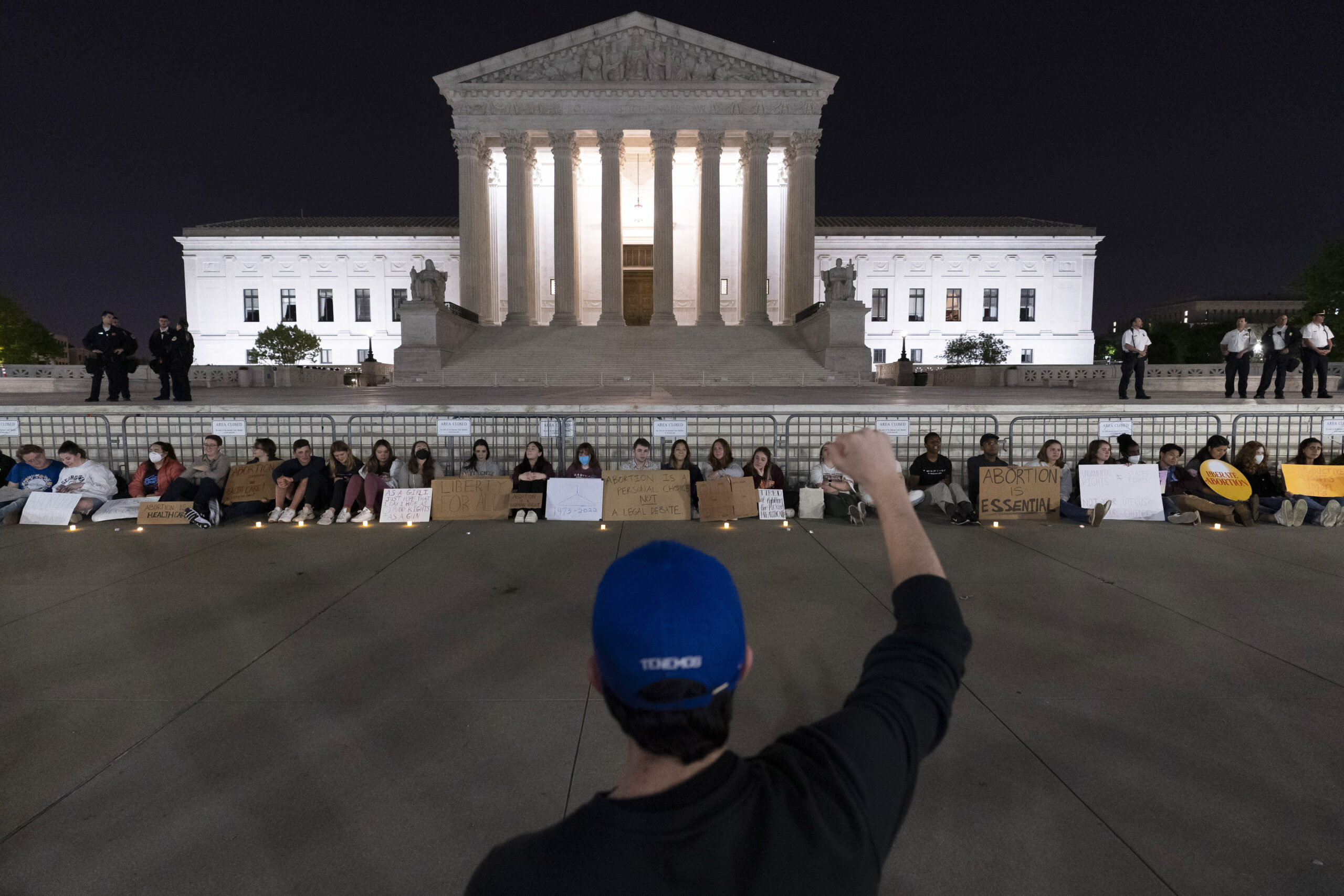 People standing outside the U.S. Supreme Court and protesting anti-abortion