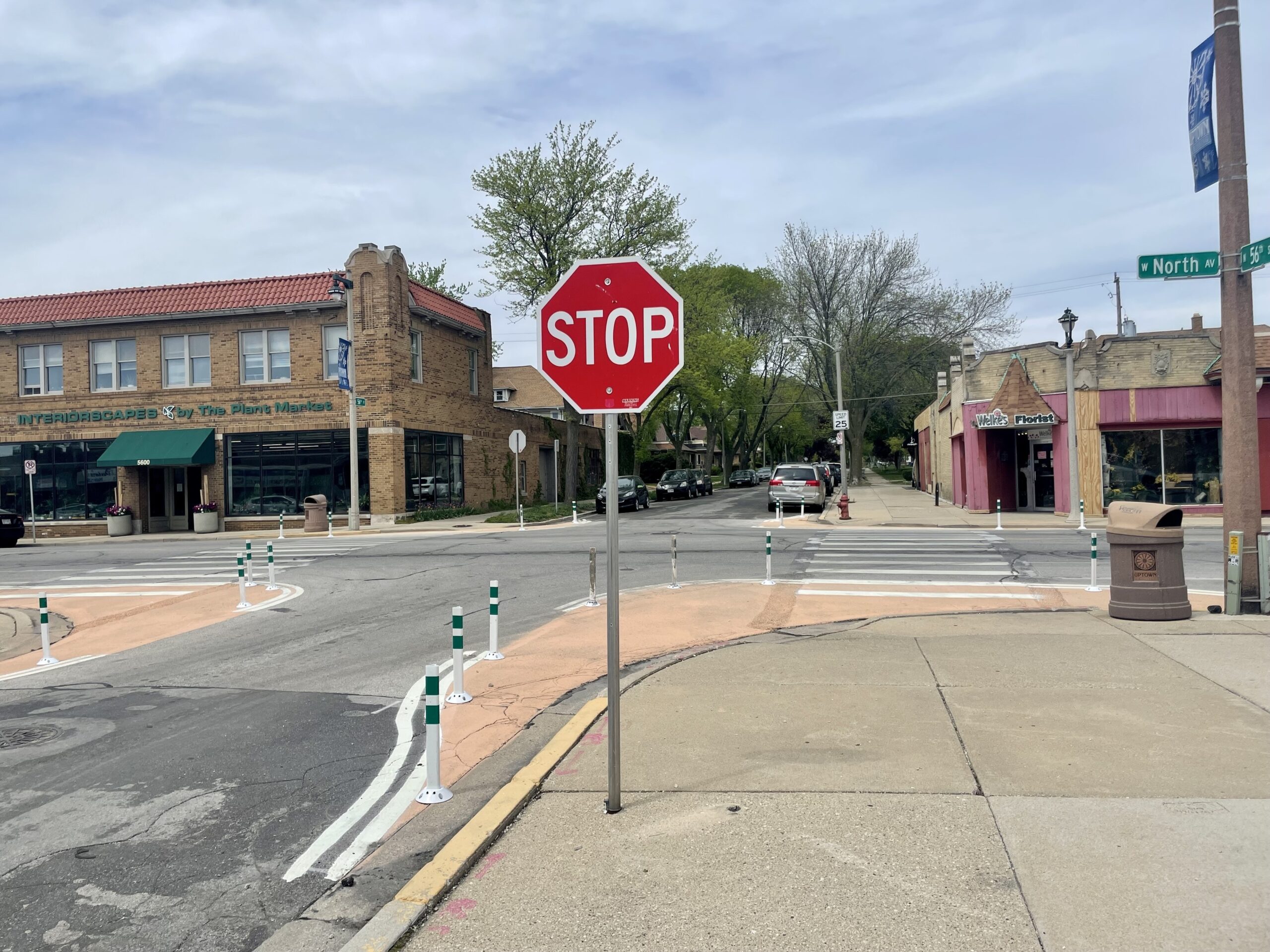 A bump-out surrounds the curb