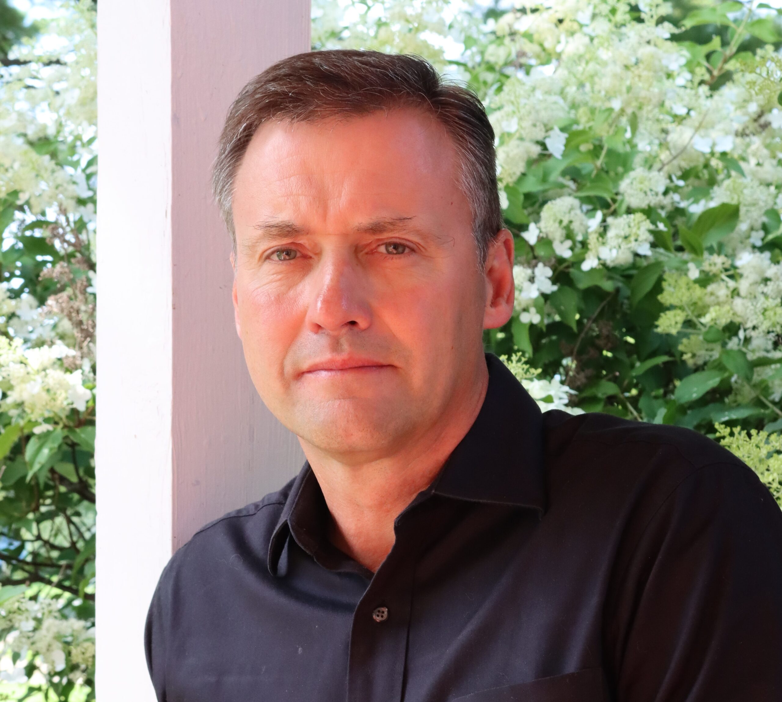 Headshot photo of John Armbruster