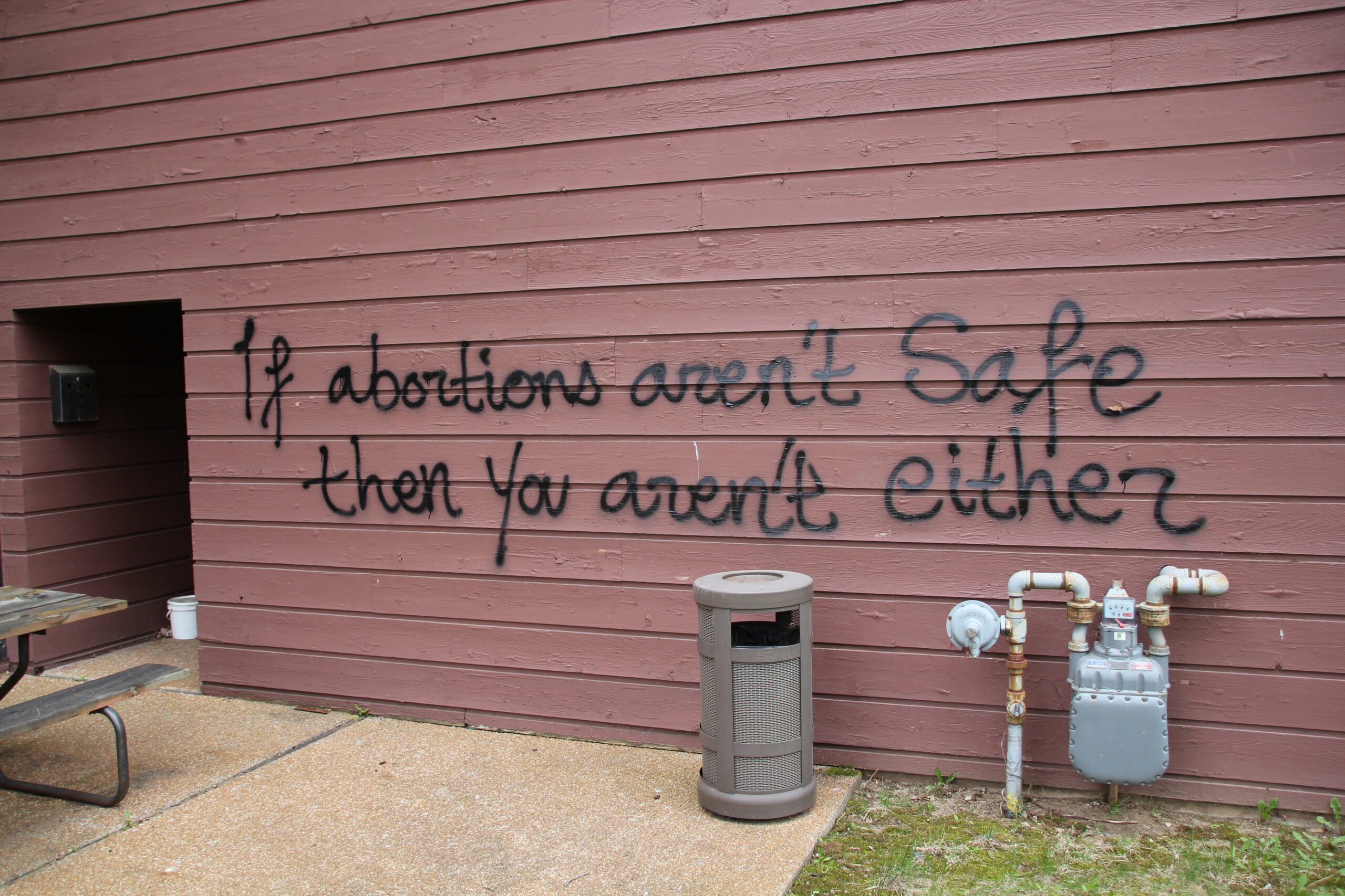 The words "If abortions aren't safe then you aren't either" were painted in black on the building of the Wisconsin Family Action's offices in Madison