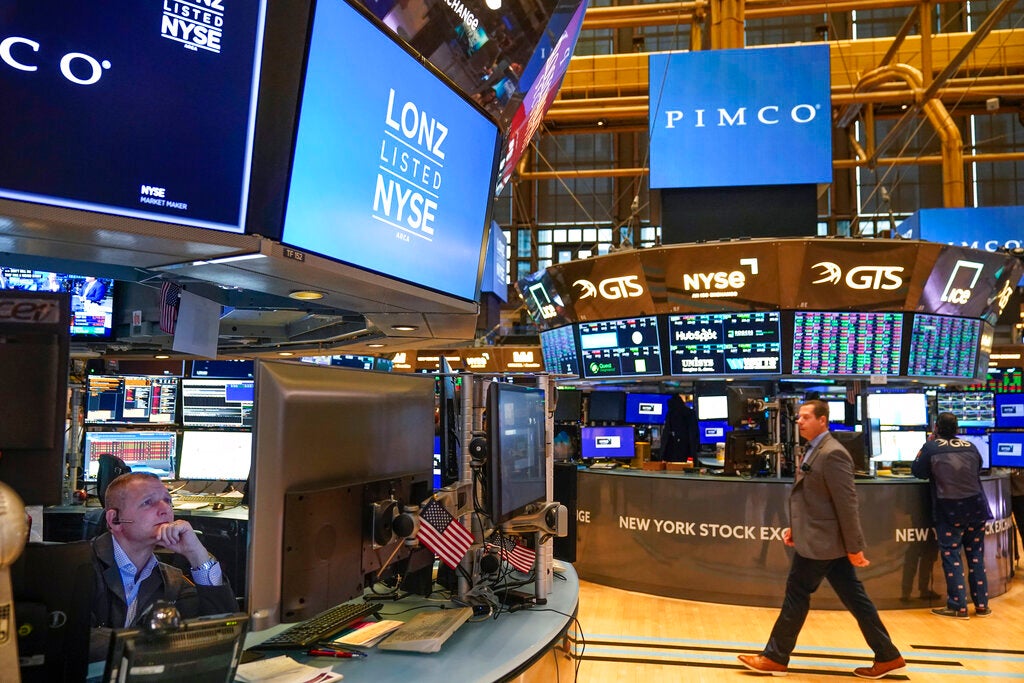 Traders on the floor at the New York Stock Exchange