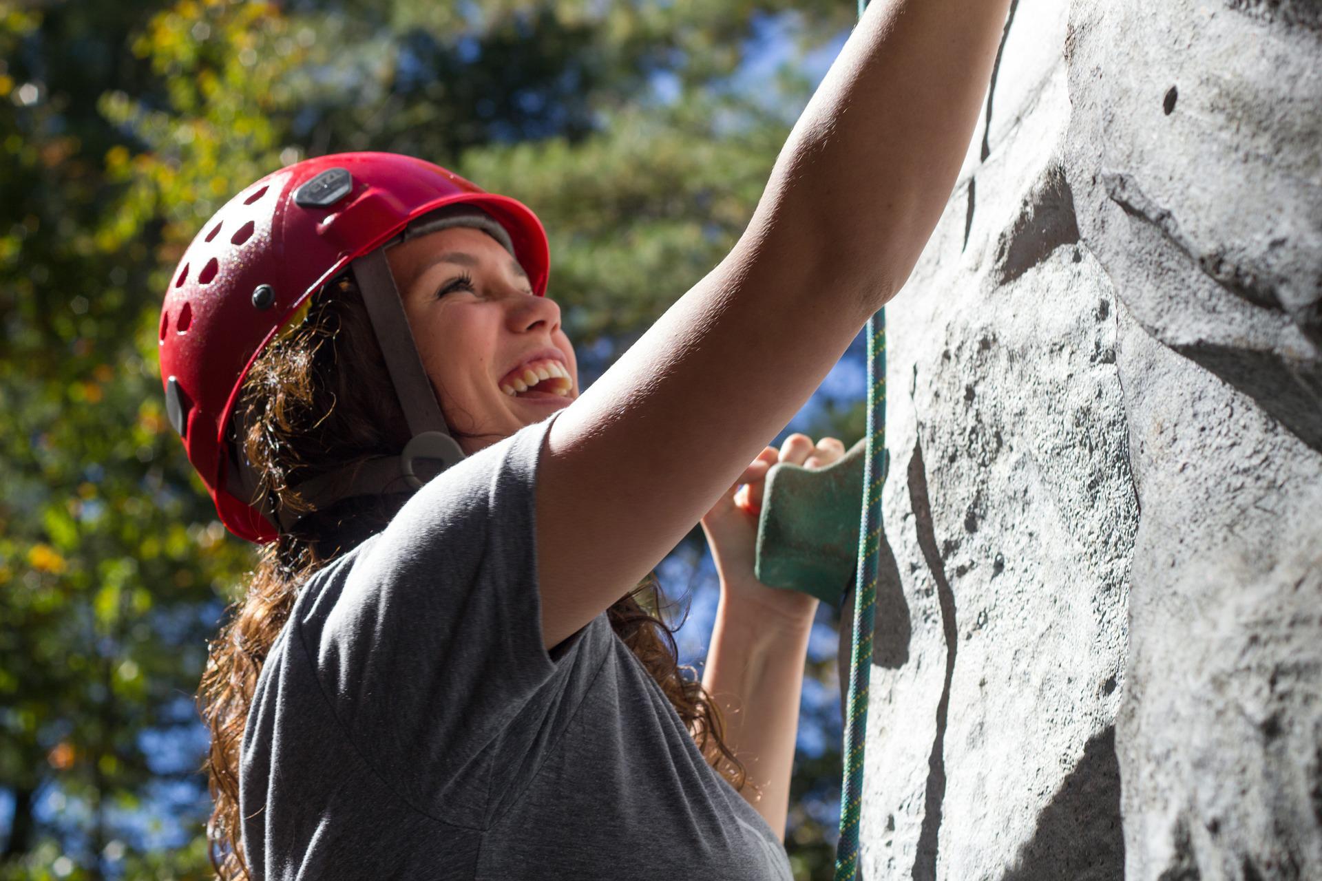 Woman rock climbing.