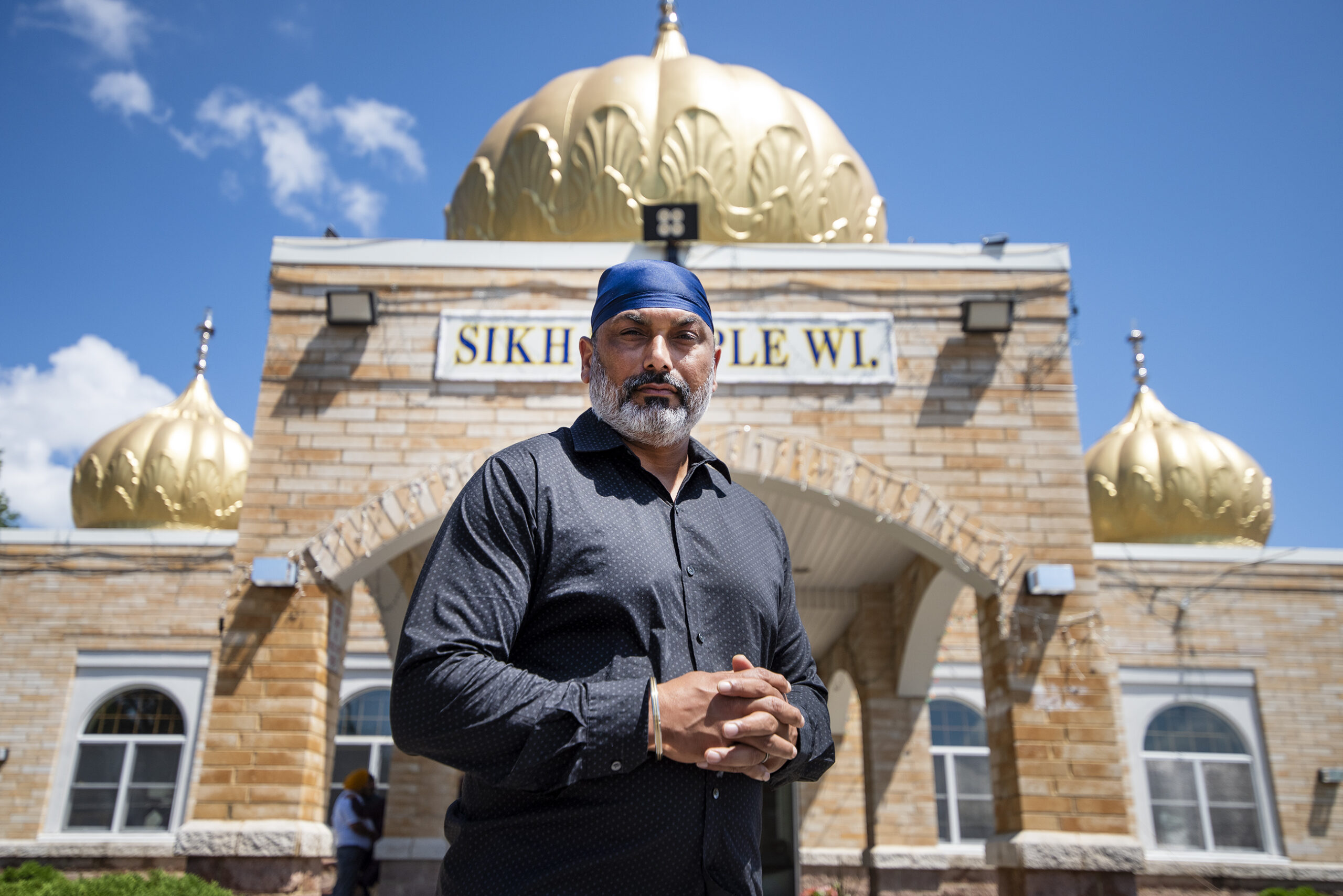 Pardeep Kaleka stands outside of the temple.