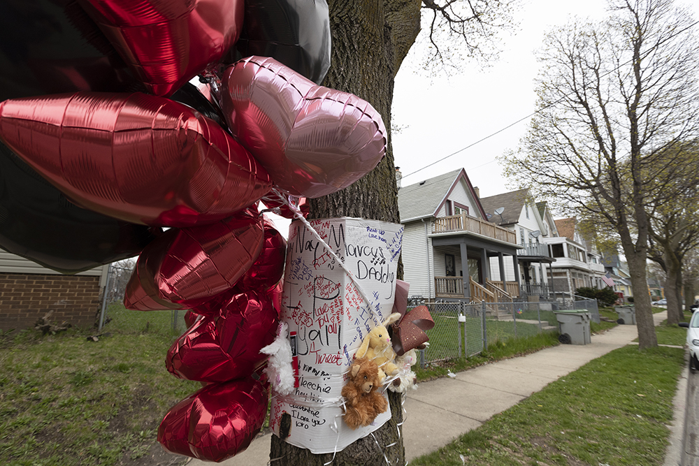 A memorial to five people shot to death on April 27, 2020 is seen on North 12th Street in Milwaukee, Wis.