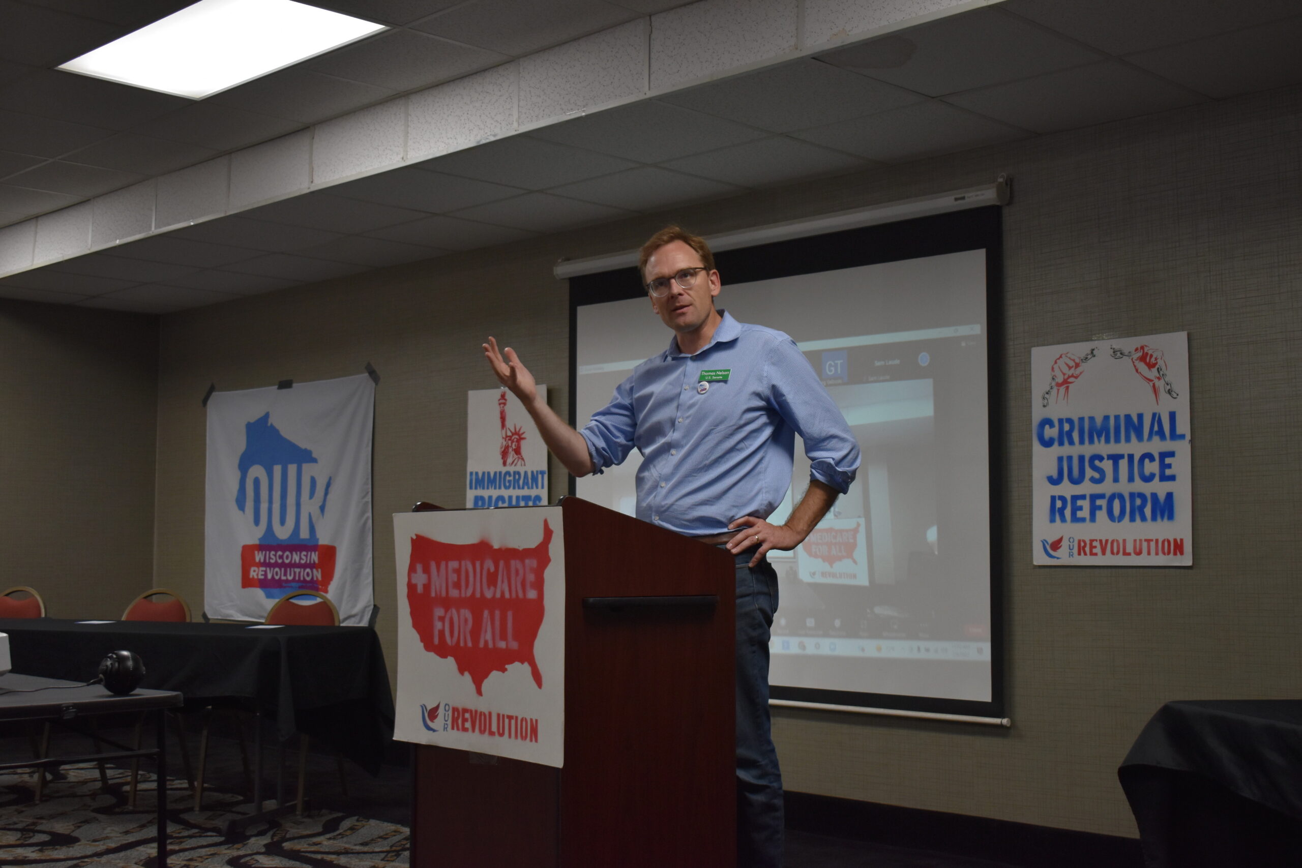 U.S. Senate candidate Tom Nelson speaks at the convention of Our Wisconsin Revolution, a liberal group whose members endorsed him for Senate