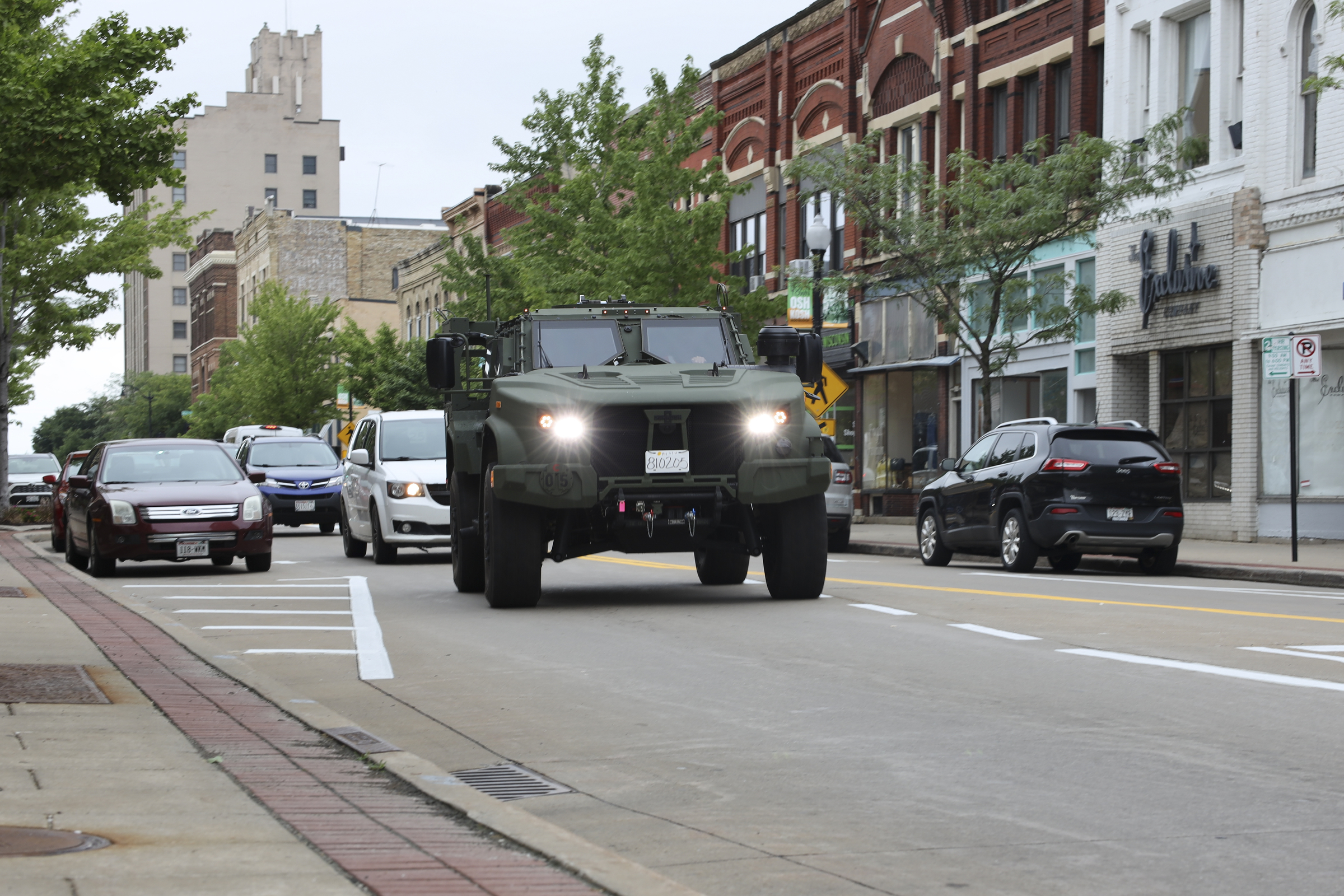Oshkosh Defense manufactures tactical vehicles for the Pentagon that regularly drive down the city’s streets