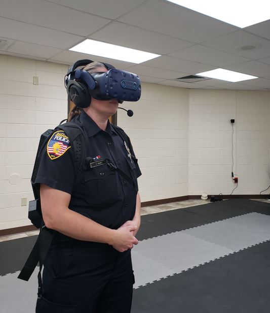 An Oshkosh Police officer participates in virtual reality training in April 2022