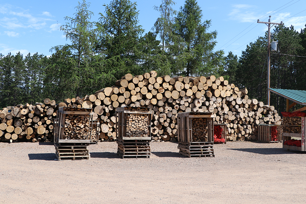 Logs are for sale outside of Winkler’s Greenhouse and Gifts in Boulder Junction, Wis.