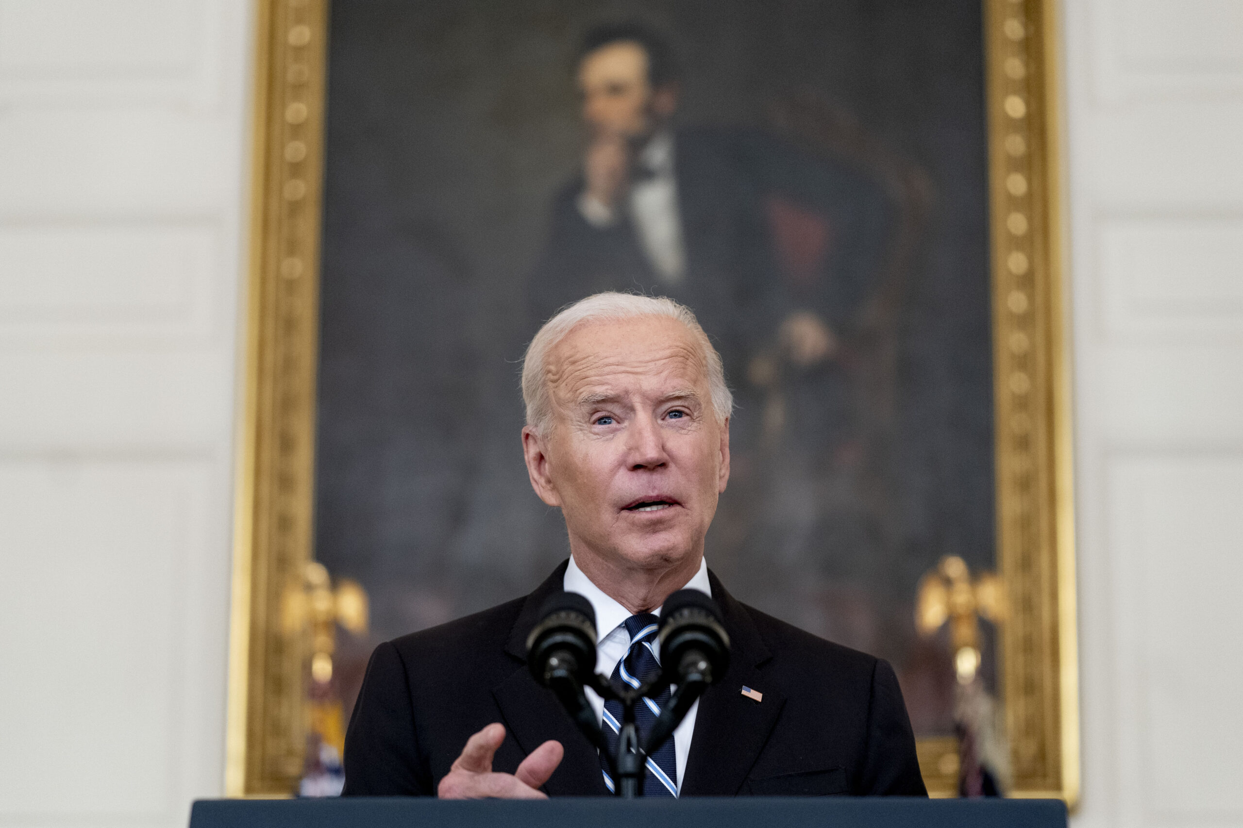 President Joe Biden speaks in the State Dining Room at the White House