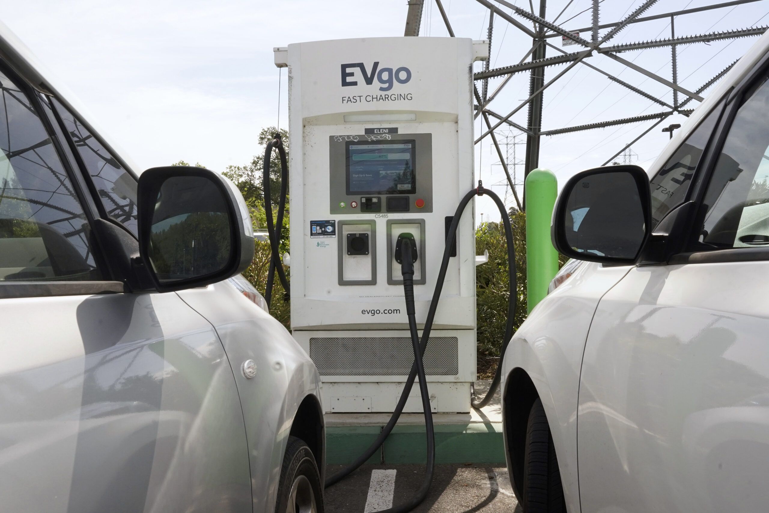 Two electric cars charging