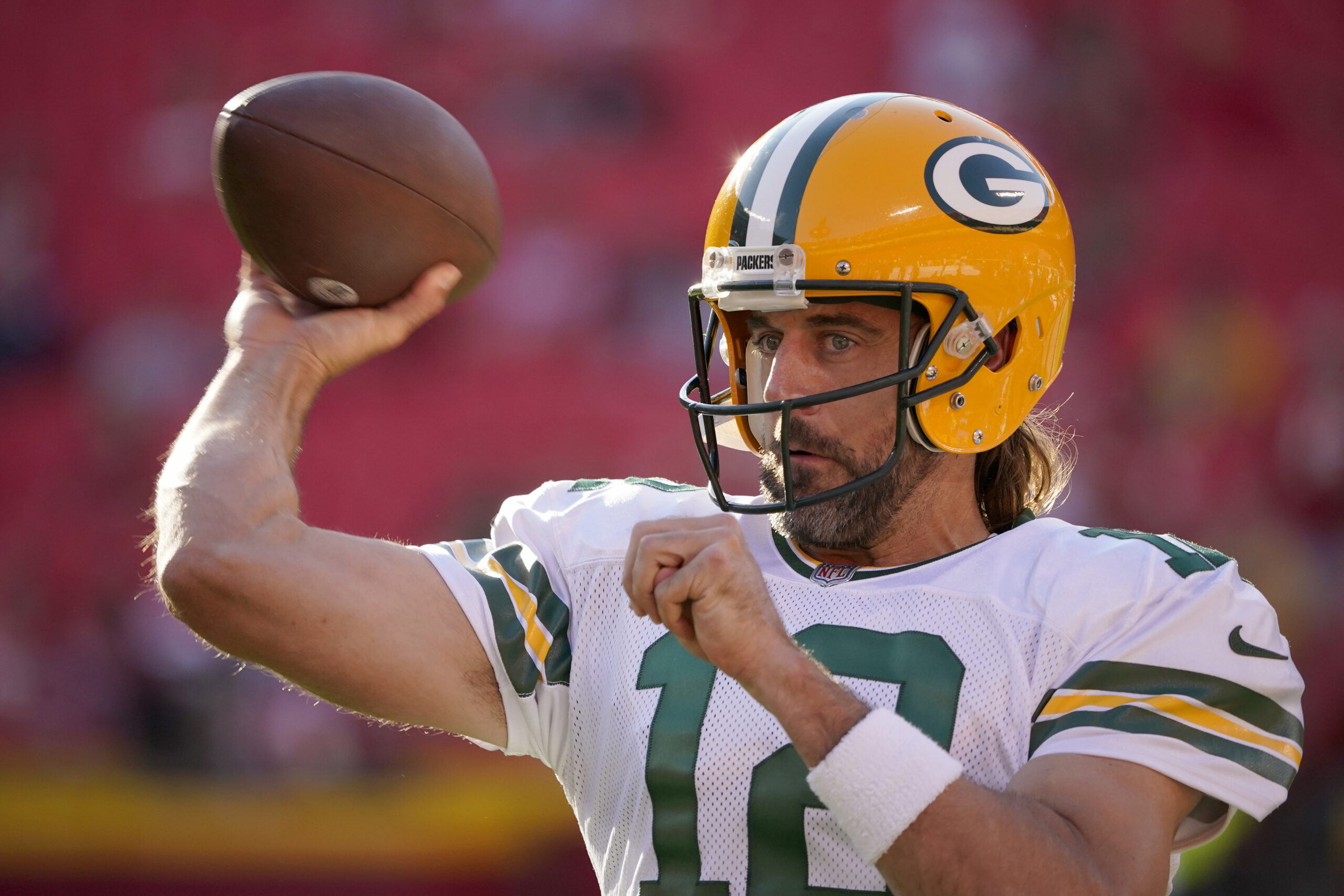 Green Bay Packers quarterback Aaron Rodgers warms up.