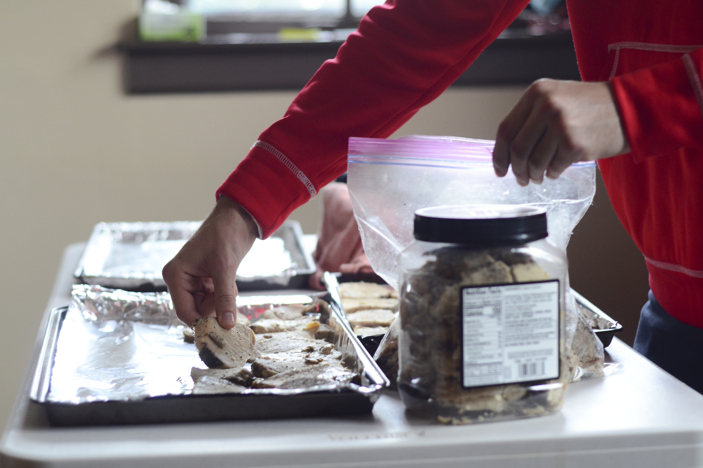 Brandon Wolf, a student volunteer with the Food Recovery Network, prepares a dish at The Crossing Campus Ministry