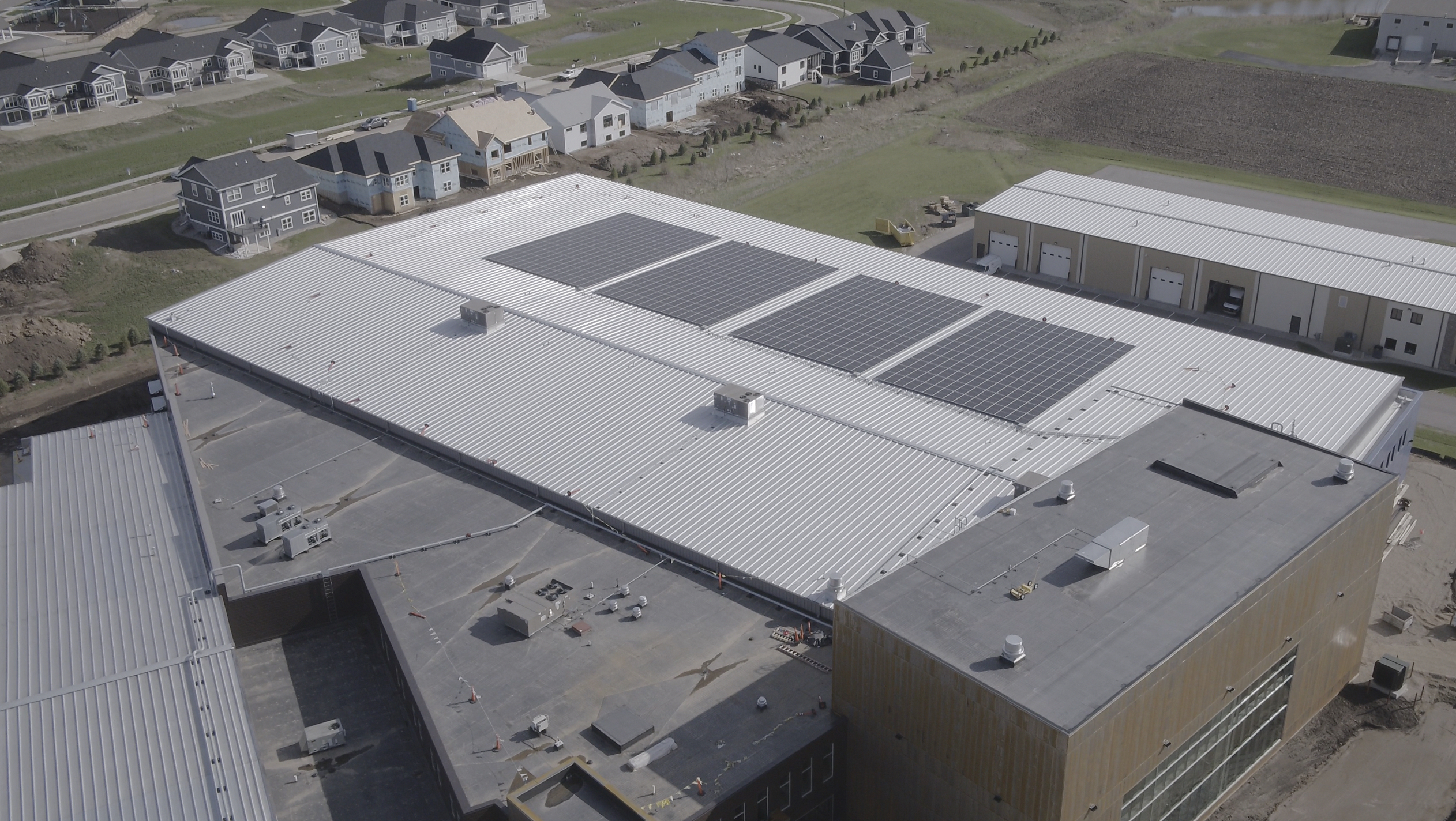 Solar panels top the roof of Octopi Brewing