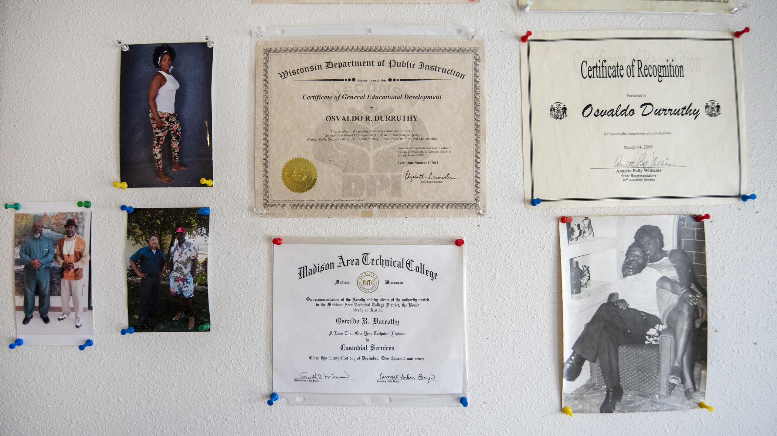 Osvaldo Durruthy's certificates and photos from Cuba on the wall
