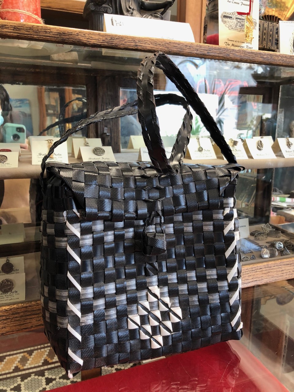 A purse made from box straps by Cuban refugees at Fort McCoy in 1980