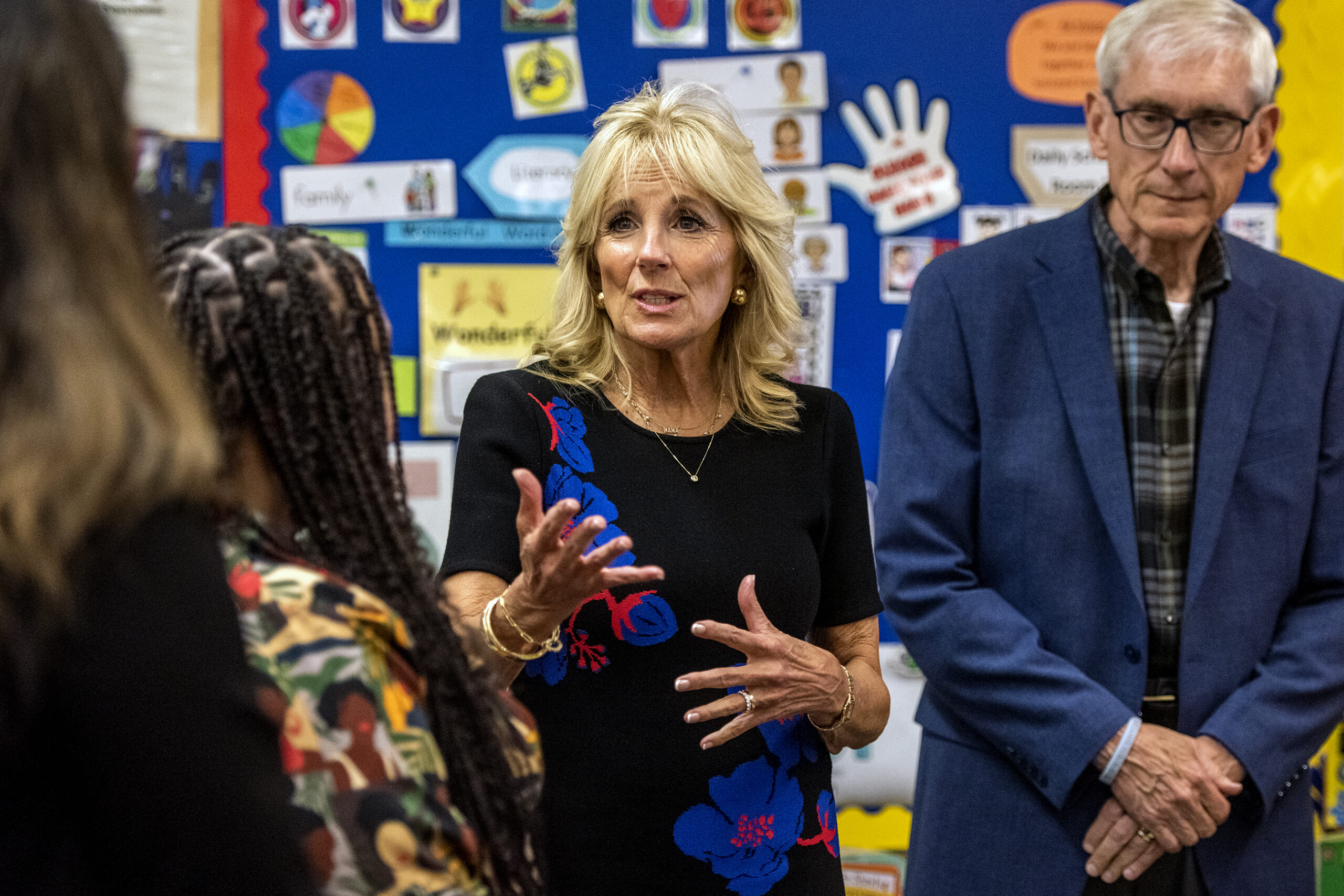 Jill Biden gestures while speaking in an elementary school classroom while standing next to Gov. Tony Evers.