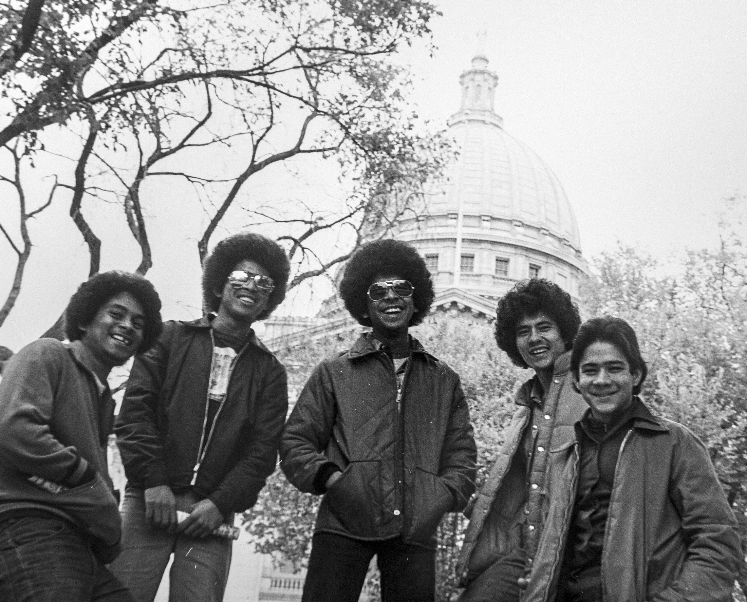 Cuban refugees pose in front of the Wisconsin State Capitol building