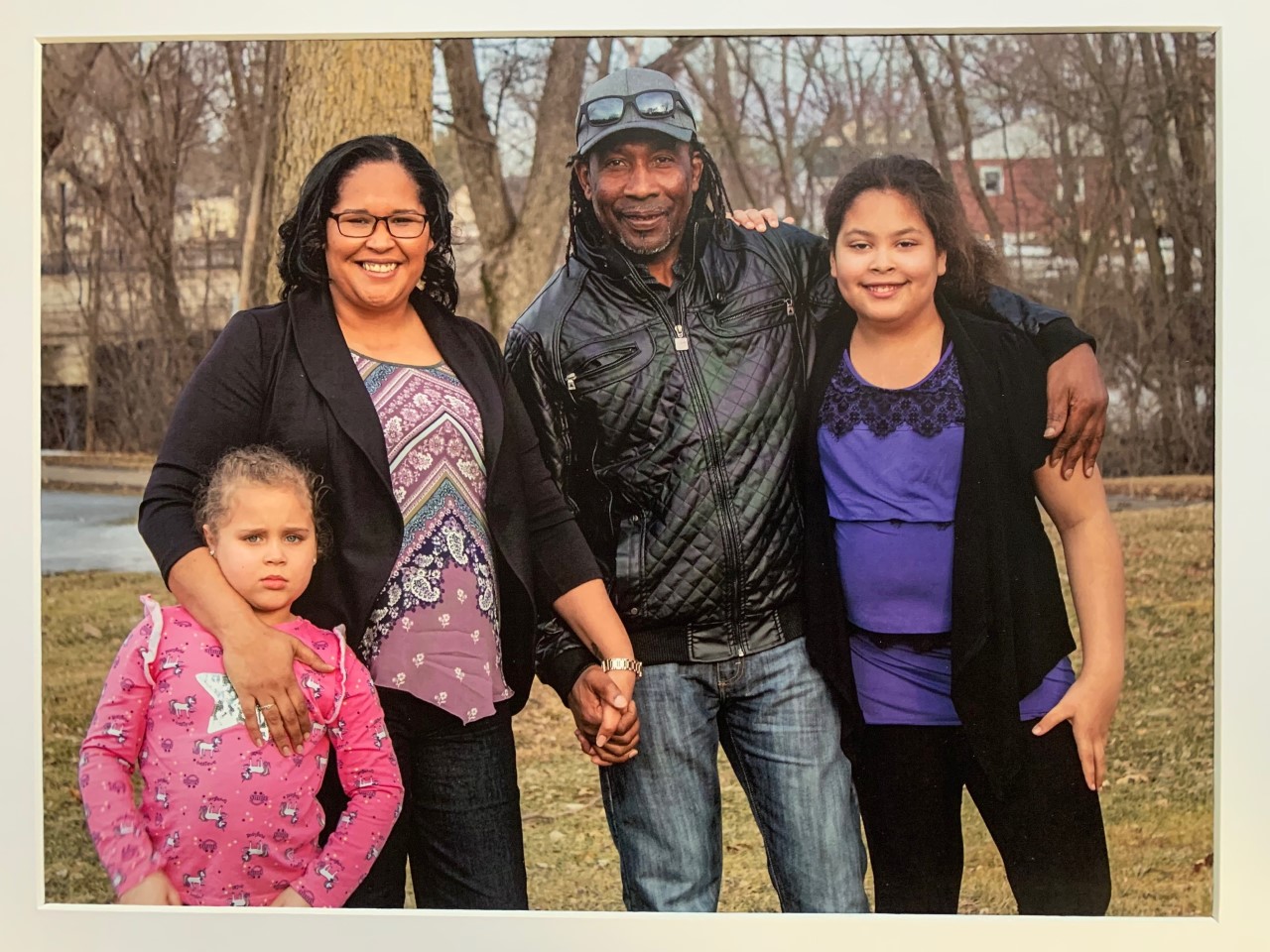 Ernesto Rodriguez with his two daughters and granddaughter