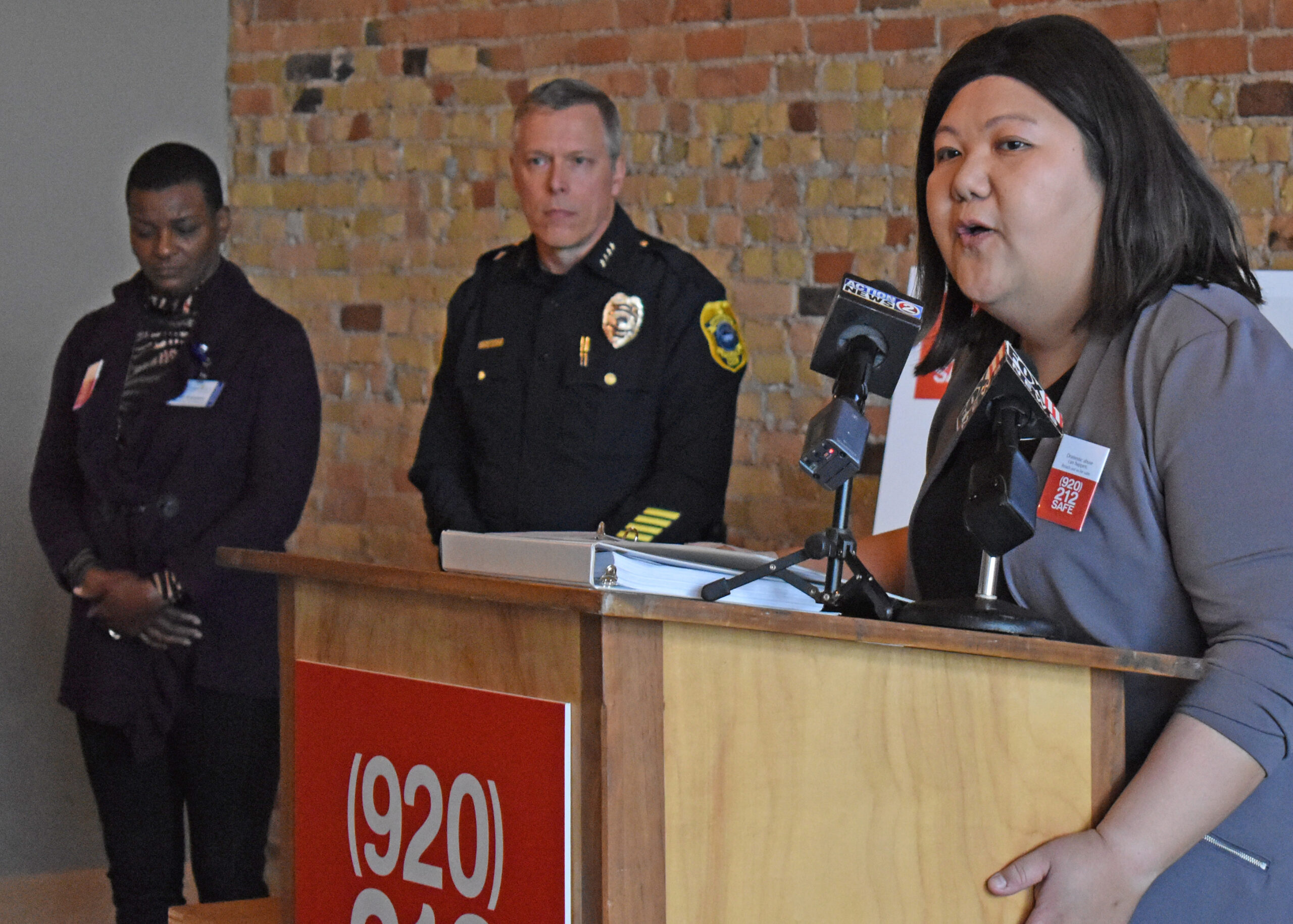 Golden House Executive Director Cheeia Lo speaks during a press conference unveiling the "Be Safe Campaign" in De Pere.