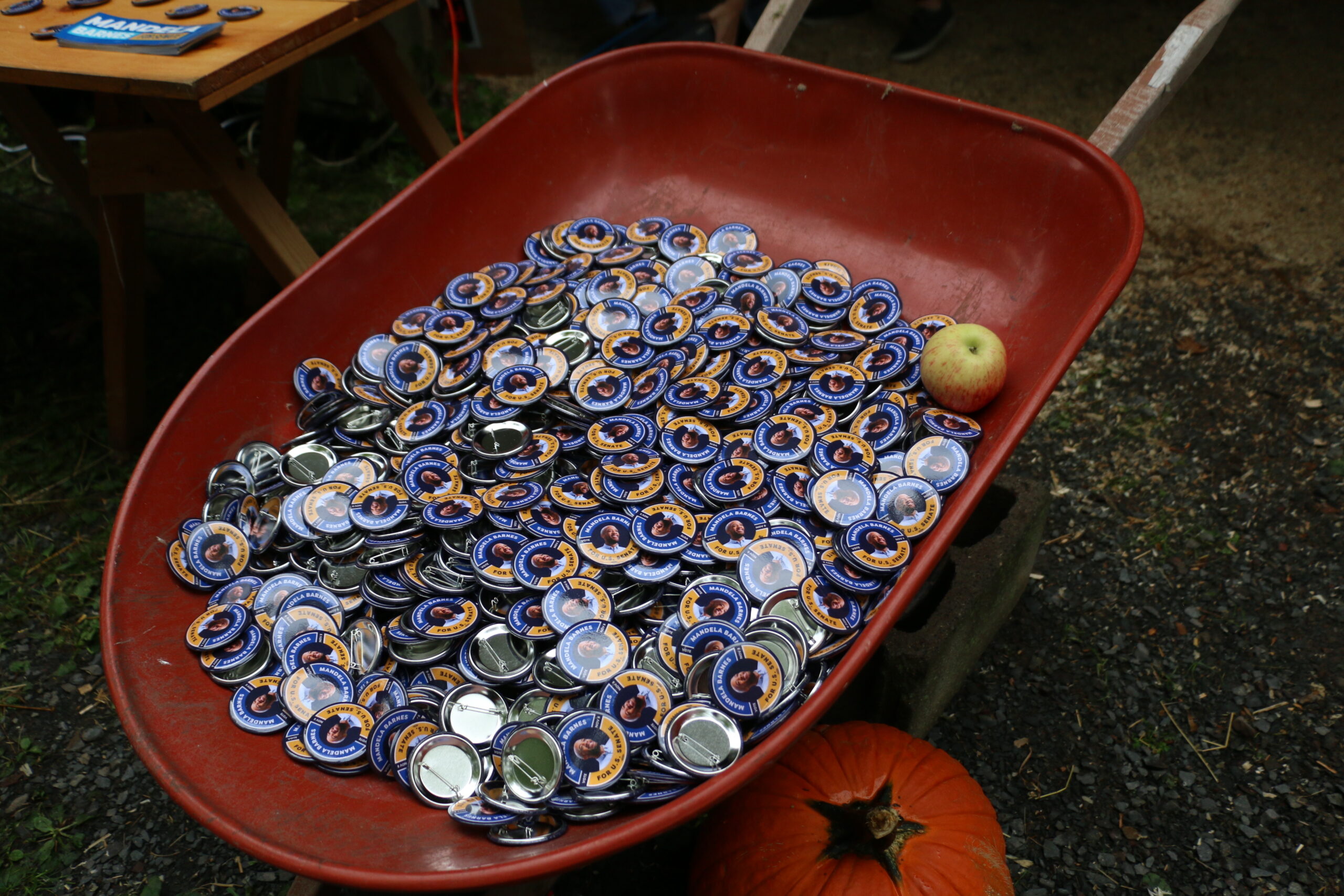 A wagon filled with ​​Mandela Barnes campaign buttons