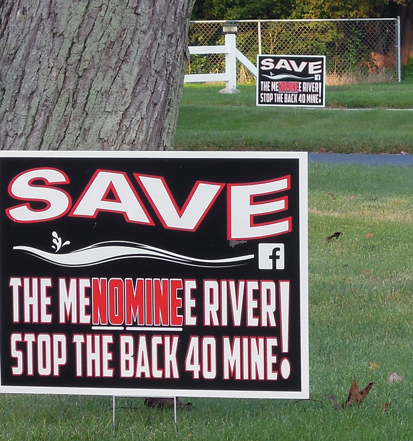 Signs opposing the Back Forty mine