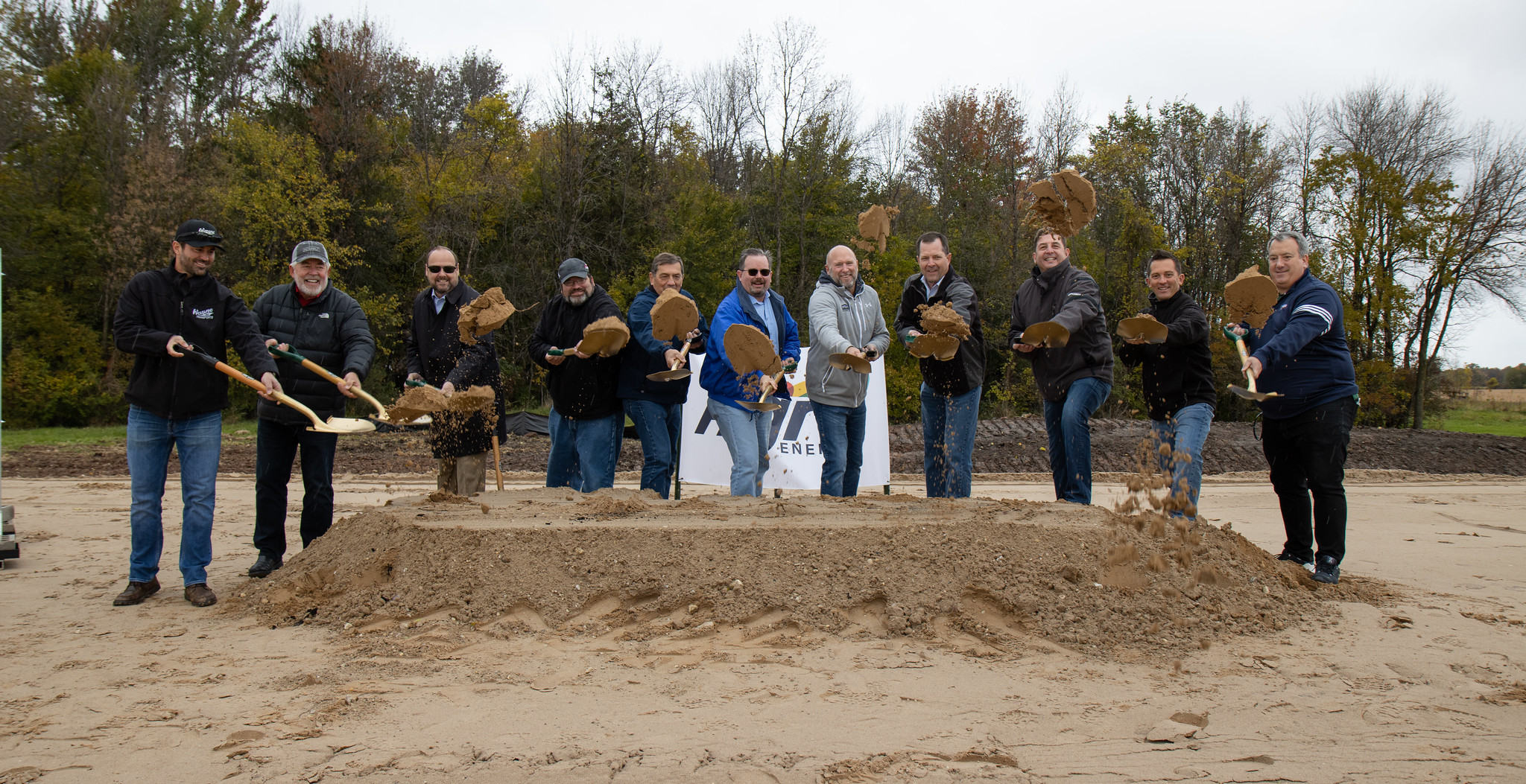 Officials participate in a groundbreaking ceremony for Wisconsin's first commercial facility to convert dairy farm waste into renewable energy.