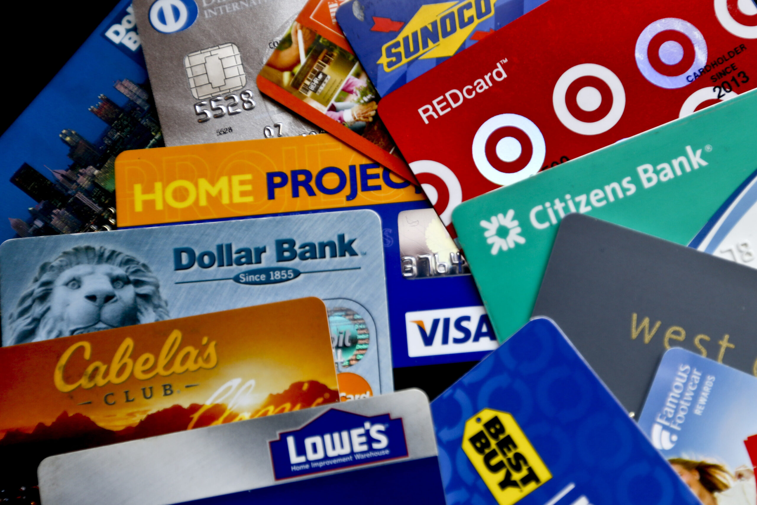 An assortment of credit cards and rewards cards.