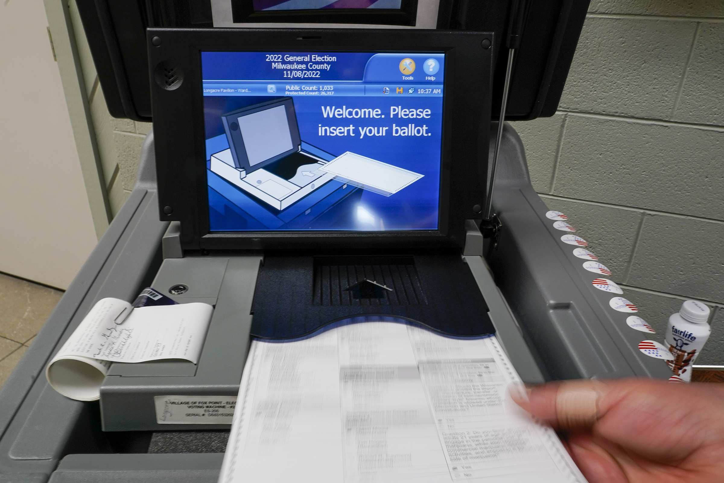 A ballot being submitted into a tabulator