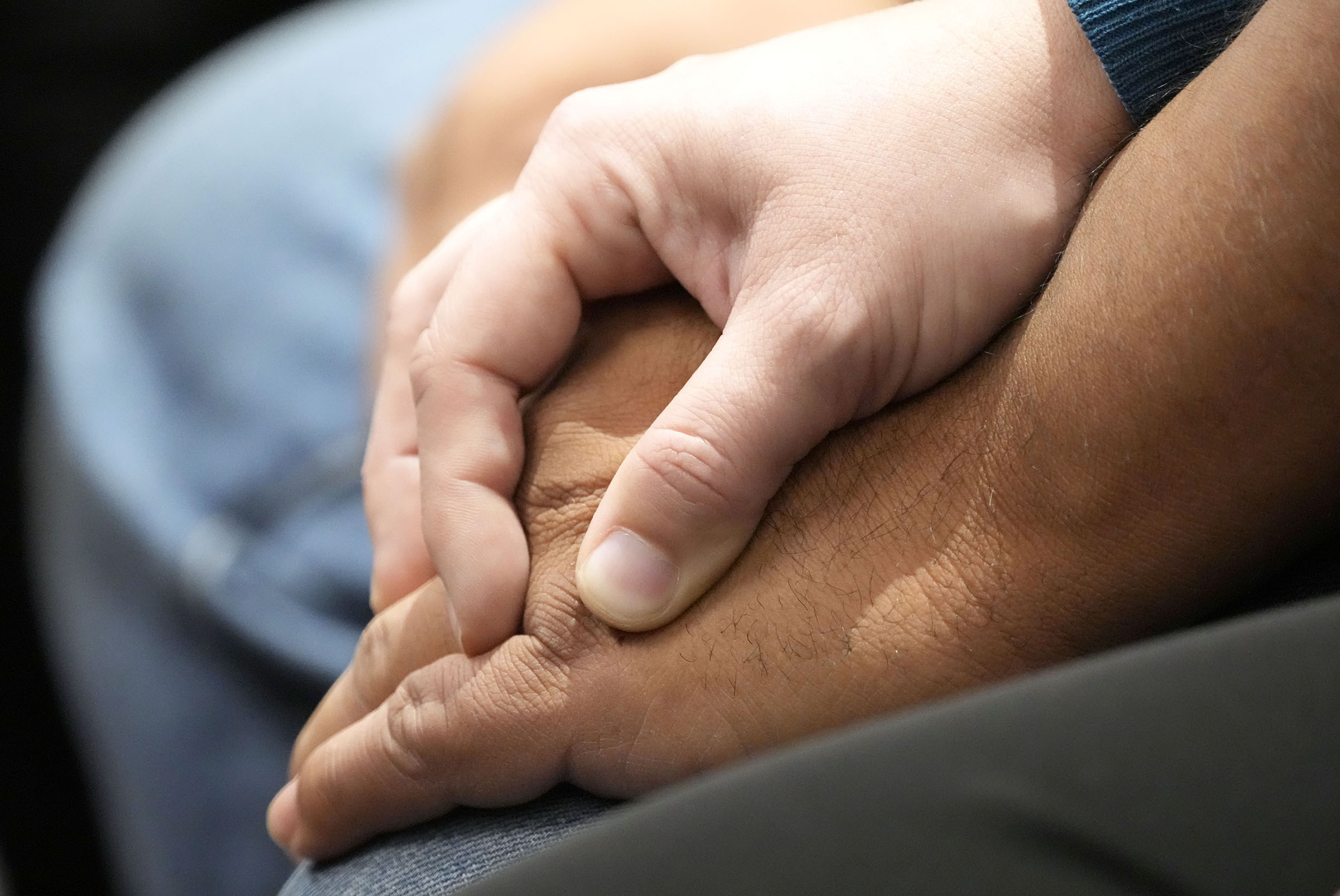 Jessica Gonzales holds her husband's hand after reading a victim statement during Darrell Brooks' sentencing